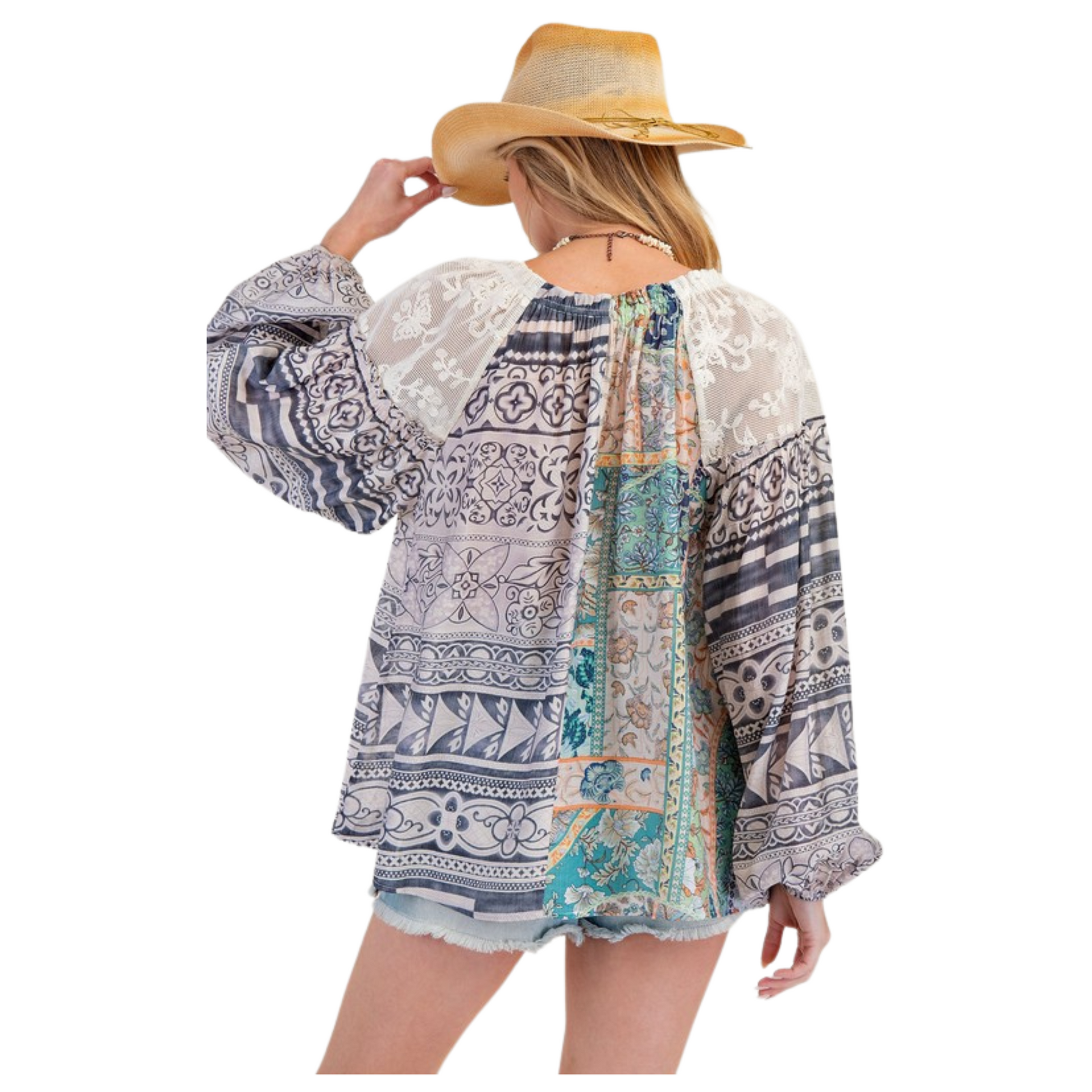 Boost your confidence with the Mix Print Loose Top by Easel. This plus size top features a loose fit and long sleeves, perfect for all-day comfort. The mixed prints add a touch of fun and flair to any outfit. Elevate your wardrobe with this must-have piece from Easel.