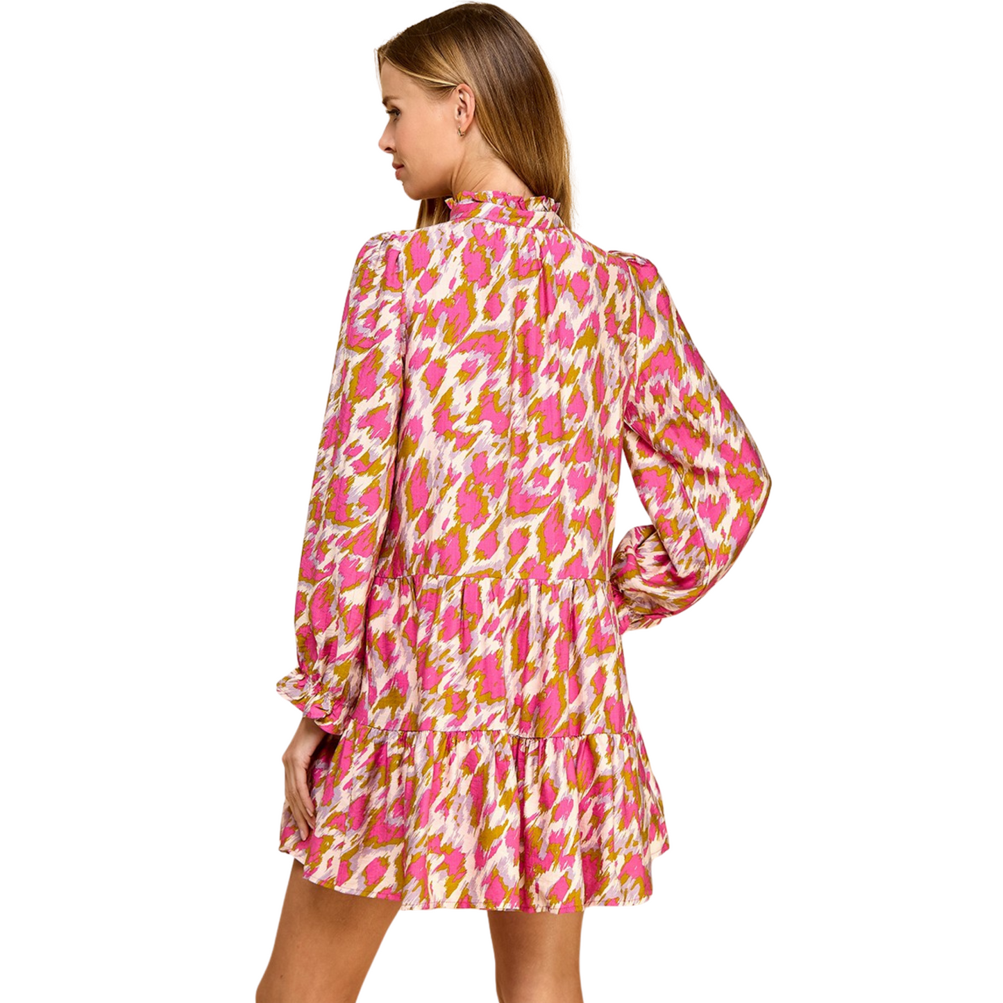 Experience chic and stylish fashion with our TCEC brand Mock Neck Mini Dress. The elegant pink color and fierce animal print exude confidence while the long sleeves and mock neck provide comfort and sophistication. Elevate your wardrobe with this must-have dress.