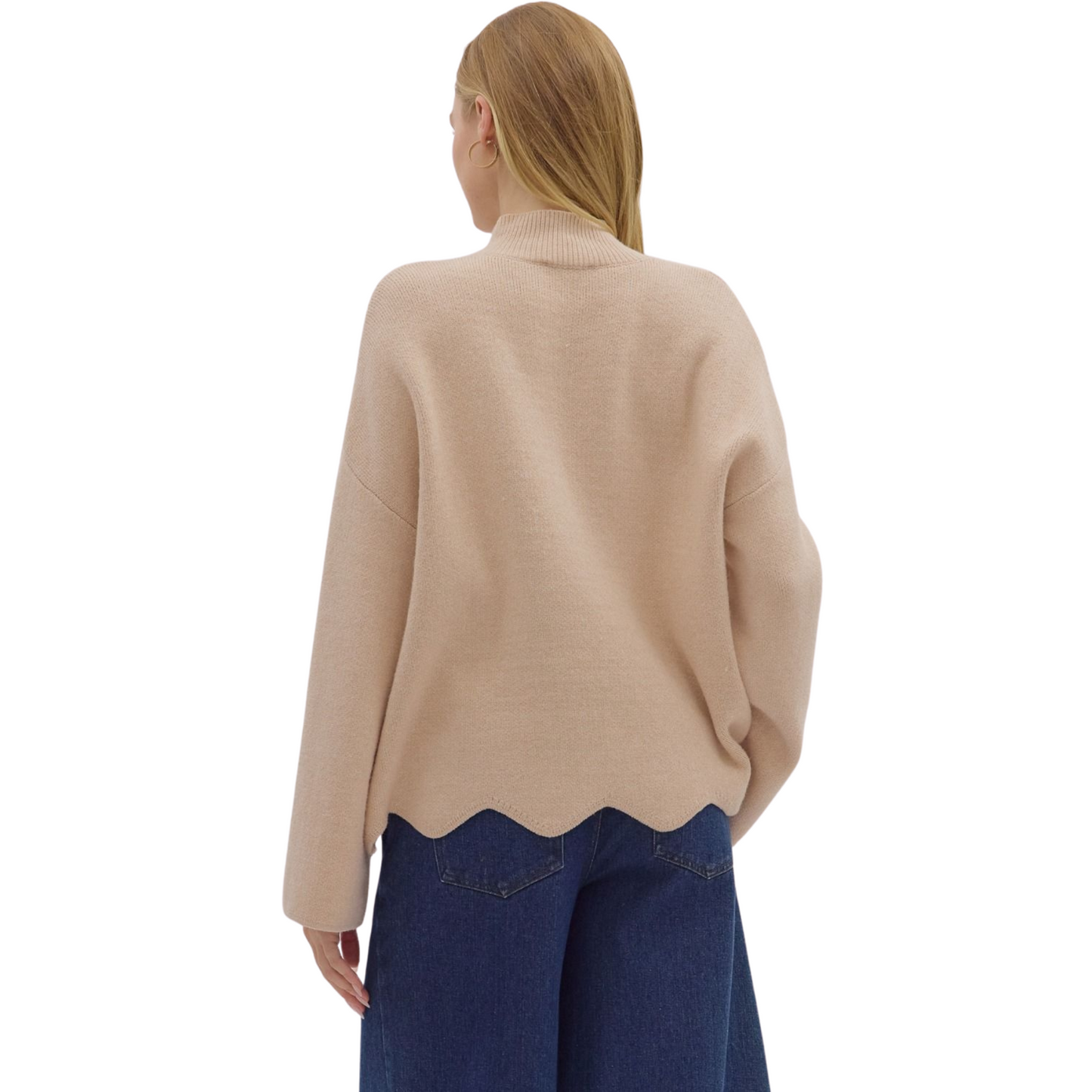 This Entro solid scalloped hem top in oatmeal offers a sophisticated take on casual wear. Featuring a ribbed mock neck and scalloped hem, this medium-weight knit pullover is unlined and non-sheer, providing comfortable coverage and effortless layering. Its refined silhouette makes it a versatile piece suitable for both professional and relaxed settings.