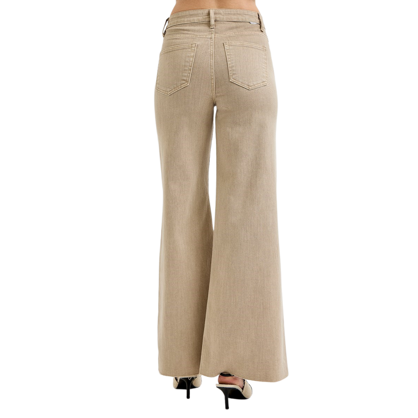 These High Rise Lurex Palazzo Pants from Risen feature a sophisticated taupe khaki color and a flattering high-rise design with built-in tummy control. Crafted to enhance your silhouette while offering comfort, they provide a sleek and polished look perfect for both professional and casual settings. The palazzo cut ensures ease of movement and a modern style that stands out effortlessly.