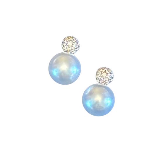 Elegantly crafted gold-dipped stud earrings featuring delicate pearl accents. These Pearl Drop Stud Earrings combine timeless sophistication with contemporary design, creating a versatile accessory suitable for both everyday wear and special occasions. The lustrous pearl detail adds a refined touch to the durable gold-dipped finish.
