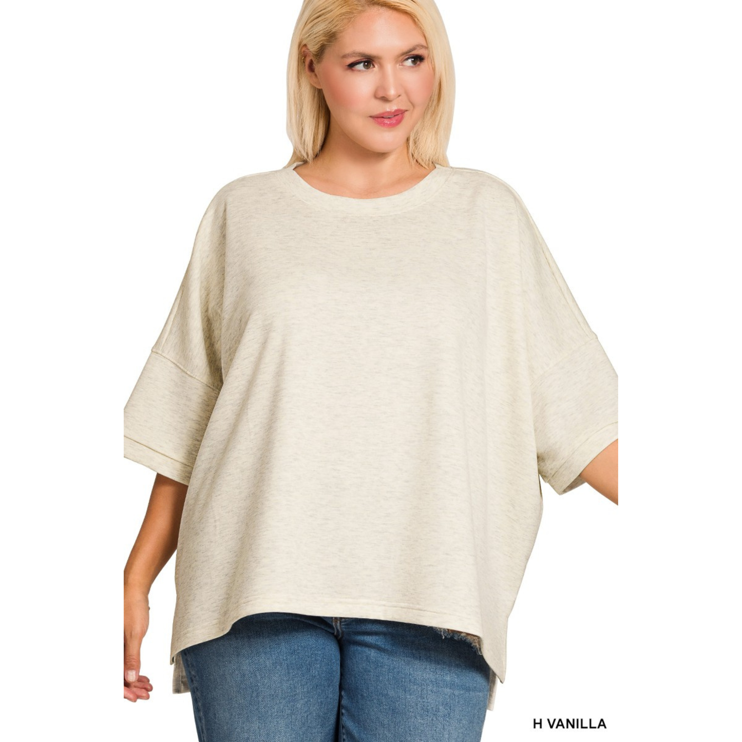 Elevate your casual wardrobe with this Zenana Scuba Round Neck Top, designed for comfort and style. Crafted in a soft vanilla hue, this plus-size piece features short sleeves and flattering side slits that add movement and dimension. The relaxed scuba fabric drapes beautifully while maintaining its shape, making it perfect for everyday wear. Pair it with your favorite bottoms for an effortlessly chic look.