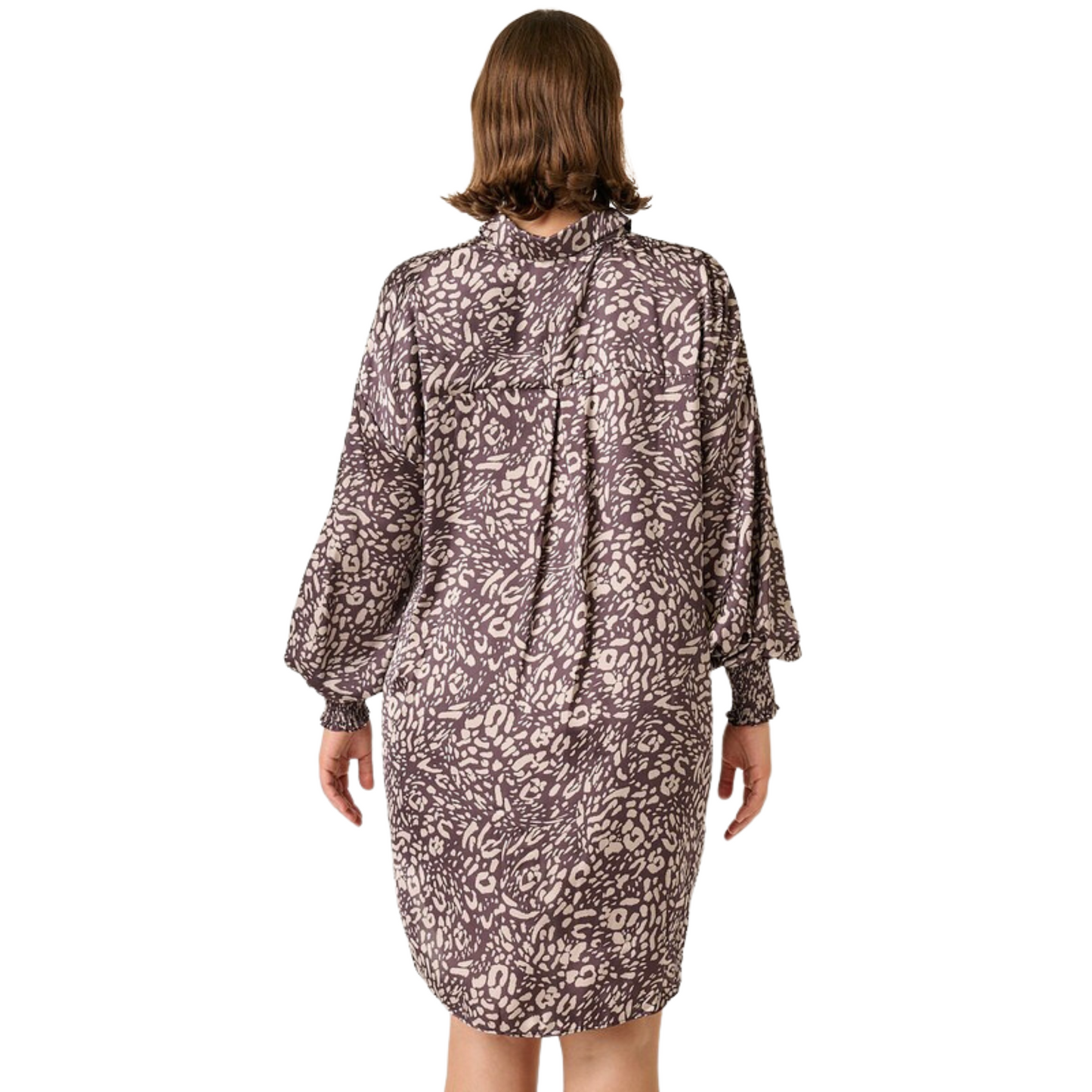 Experience timeless elegance in our Leopard Print Shirt Dress. Crafted from smooth satin woven fabric with a leopard print, it features a collar detail and placket with button closure. Long sleeves with smocking cuff bands complete the look in a sophisticated charcoal color.