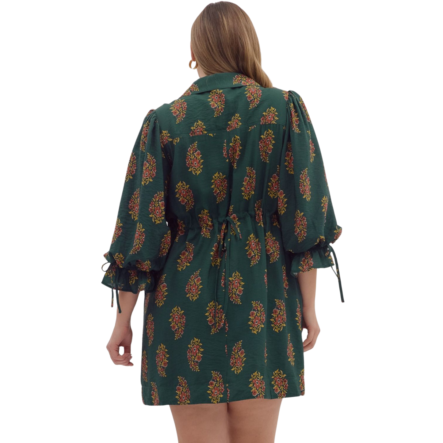 This Entro puff sleeve mini dress in a rich hunter green features an eye-catching abstract print designed to flatter plus-size figures. Its playful puff sleeves and mini length combine style with a comfortable fit, making it ideal for both casual and dressier occasions. The dress offers a confident silhouette while showcasing unique design details that highlight your curves effortlessly. Perfect for those who appreciate bold fashion with a tailored touch.