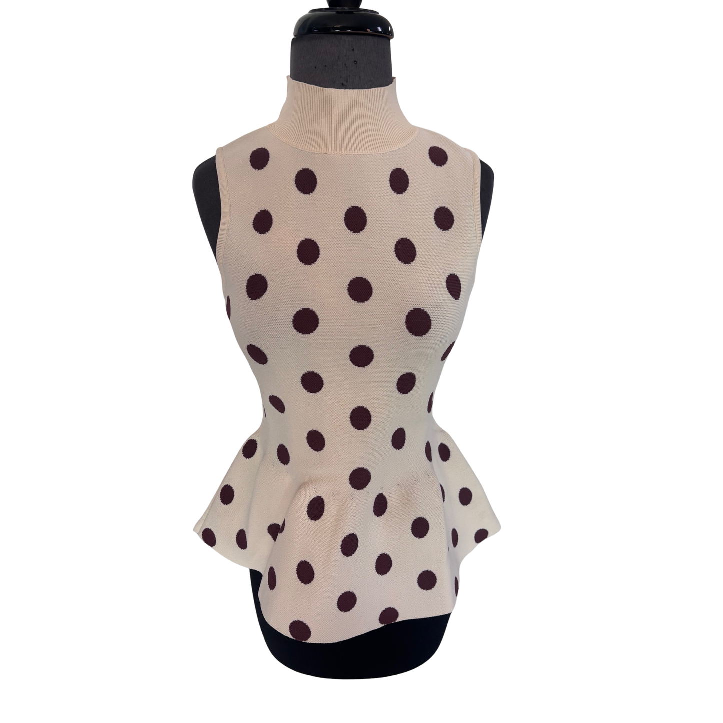 Elevate your everyday wardrobe with this sleek Entro sleeveless mock neck top in a versatile ecru tone. The clean mock neckline provides a polished, modern silhouette while the sleeveless design offers effortless layering potential. Perfect for pairing with jeans, trousers, or skirts, this timeless piece transitions seamlessly from casual to professional settings. The neutral ecru shade complements any color palette, making it an essential staple for a well-rounded closet.