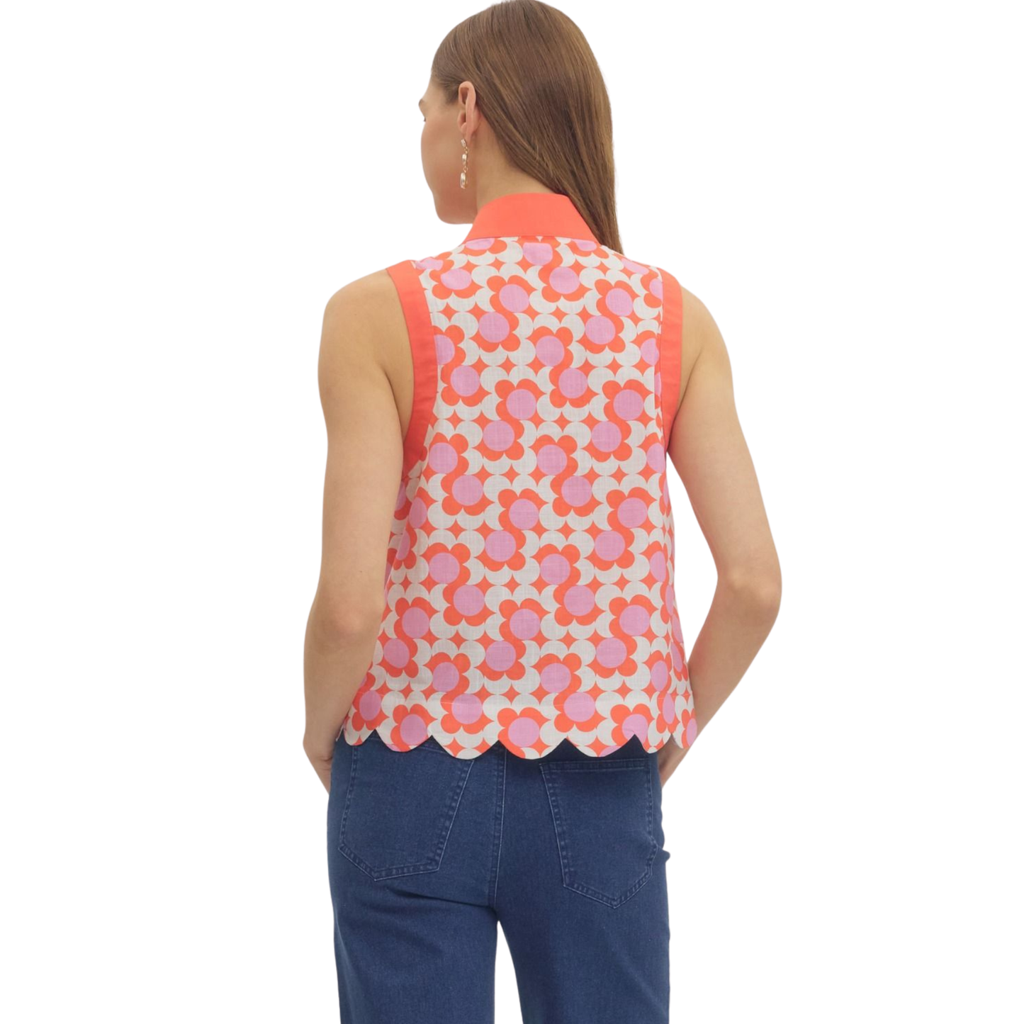 Elevate your casual wardrobe with this striking Entro sleeveless top. The vibrant coral abstract print adds visual interest and pairs effortlessly with denim or tailored pants. Cut with a flattering v-neckline and sleeveless silhouette, it's perfect for warm weather styling or layering under jackets. A versatile piece that transitions seamlessly from day to night.