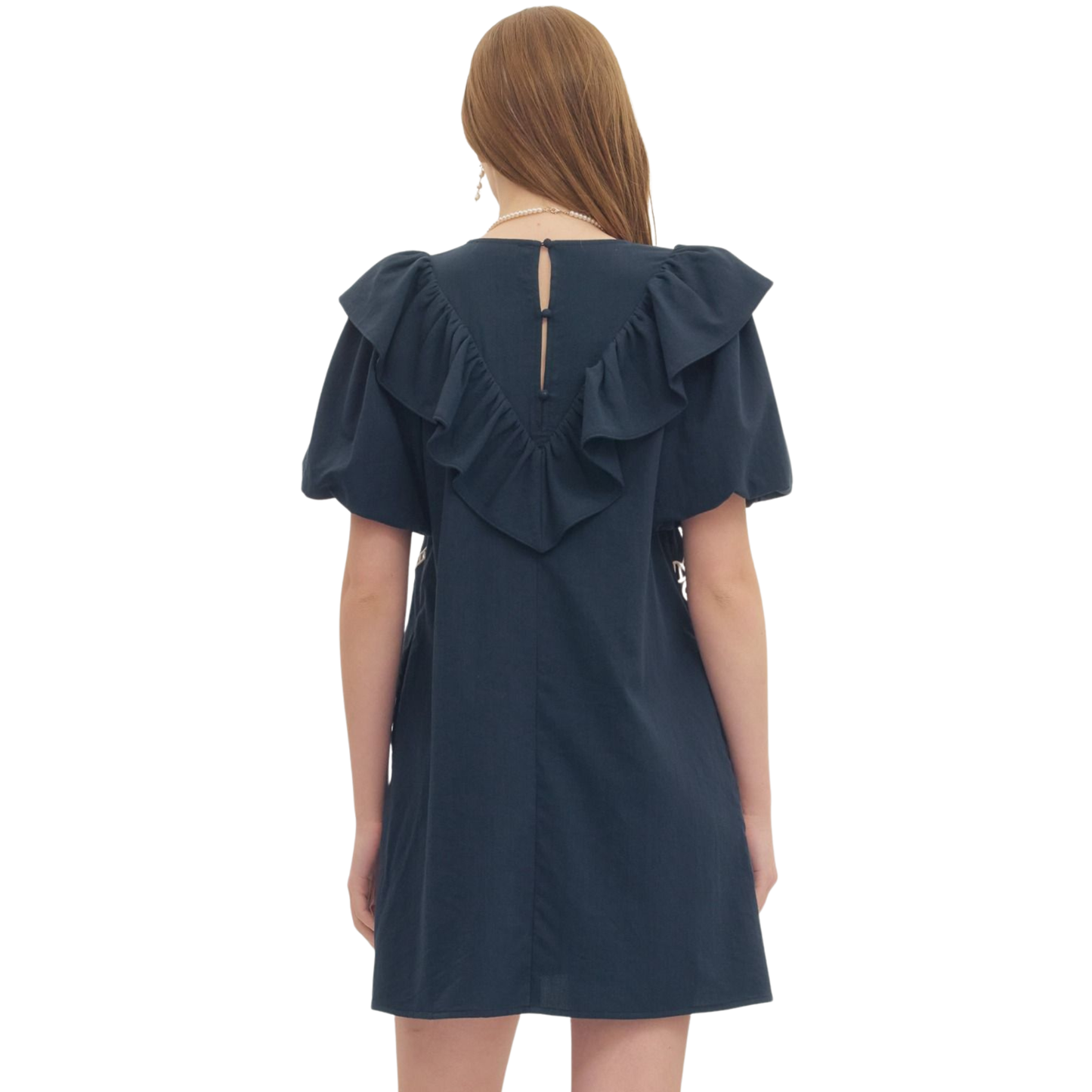 Navy mini dress by Entro featuring a charming ruffle trim yoke and short puff sleeves. This playful silhouette combines feminine details with a flattering fit, perfect for casual outings or dressed-up occasions. The puff sleeves add a touch of vintage-inspired charm while the ruffle trim yoke creates visual interest at the neckline. Ideal for spring and summer styling.