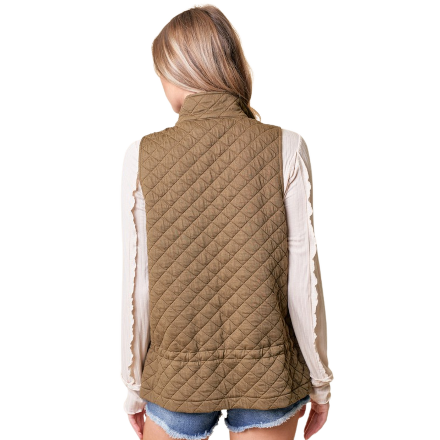 This sleeveless Quilted Vest from Doe and Rae features a zip-up front for adjustable comfort and ease of wear. Its brown color provides versatile styling options, while the quilted design offers lightweight warmth and sleek insulation. Ideal for layering in transitional weather, this vest combines functionality with refined simplicity, perfect for those seeking expert craftsmanship in their outerwear.