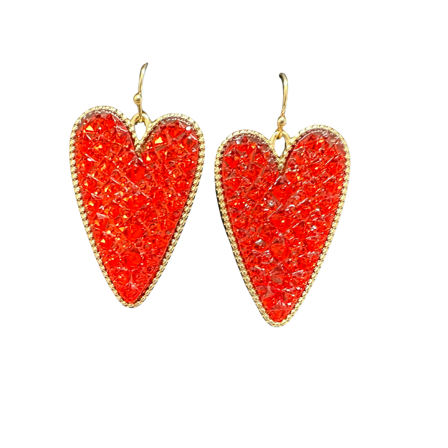 Elevate your Valentine's Day look with these striking red heart dangle earrings from Perdido Gems. Crafted with precision, each piece features a vibrant red heart that catches the light beautifully as it moves. The dangling design adds graceful motion and dimension to any outfit, making them ideal for romantic occasions or everyday elegance. A timeless choice that expresses sentiment with sophisticated style.