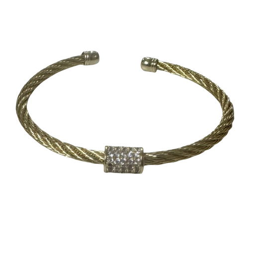 Expertly designed with pure gold, this open cuff bangle is the perfect addition to any jewelry collection. Its sleek and modern design adds a touch of elegance to any outfit, while the rhinestone accent adds a touch of sparkle. Upgrade your style with this stunning bangle.