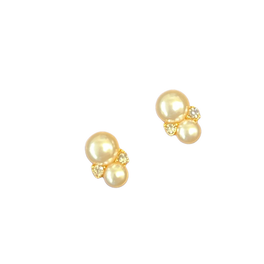 Upgrade your accessory game with these elegant Pearl and Rhinestone Studs. Crafted with gold and adorned with stunning pearl accents and shimmering rhinestones, these small stud earrings add a touch of sophistication to any look. Perfect for a subtle yet luxurious touch.