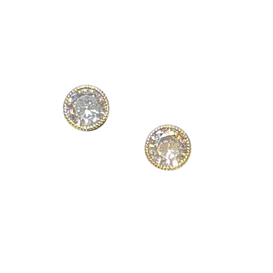 These Rhinestone Stud Earrings, from Tell your Tale brand, feature a beautiful gold design with sparkling rhinestone accents. Perfect for adding a touch of elegance to any outfit.