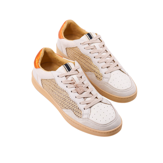 The Roma tennis shoe by Shushop combines a sophisticated gold woven design with striking orange accents, creating a visually dynamic and stylish look. Crafted with precision, this shoe offers both aesthetic appeal and reliable performance, ideal for those seeking expert-level quality and distinctive style on and off the court.