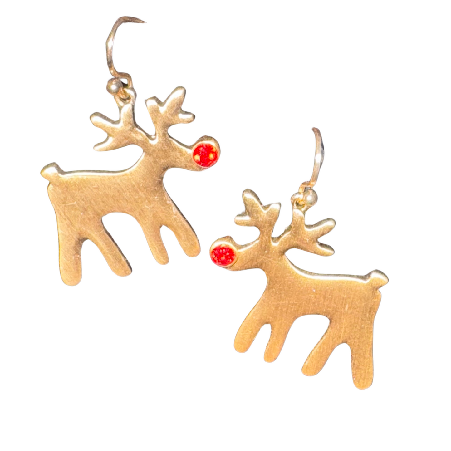 Add a touch of holiday cheer with our Rudolph Dangle Earrings. Crafted with gold and featuring a red gem nose, these reindeer-shaped earrings are the perfect accessory for Christmas festivities. Their dainty dangle design adds a playful touch to any outfit.