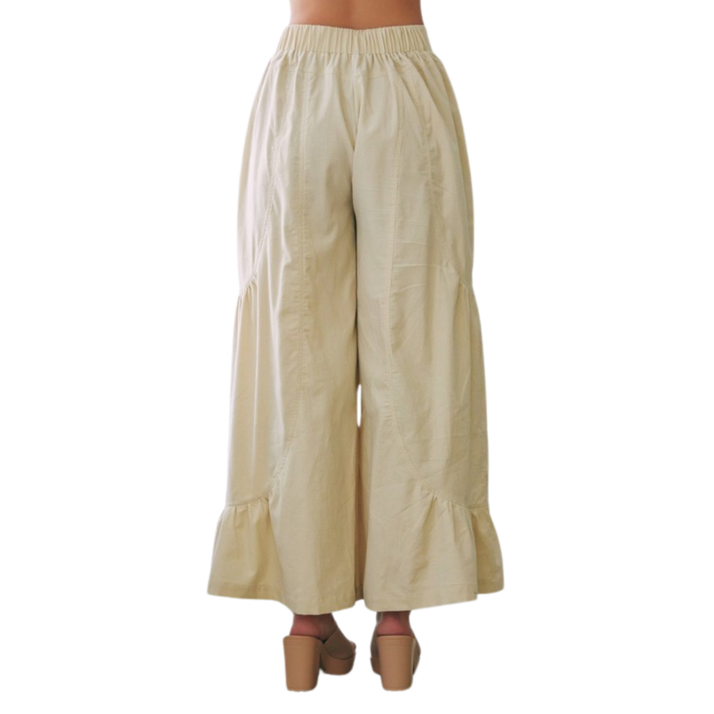 Expertly designed with a sophisticated ecru color, these Wide Leg Ruffle Pants by Mustard Seed brand exude a chic and polished look. The side leg design and delicate ruffle detail elevate the style, making them a must-have addition to any wardrobe.