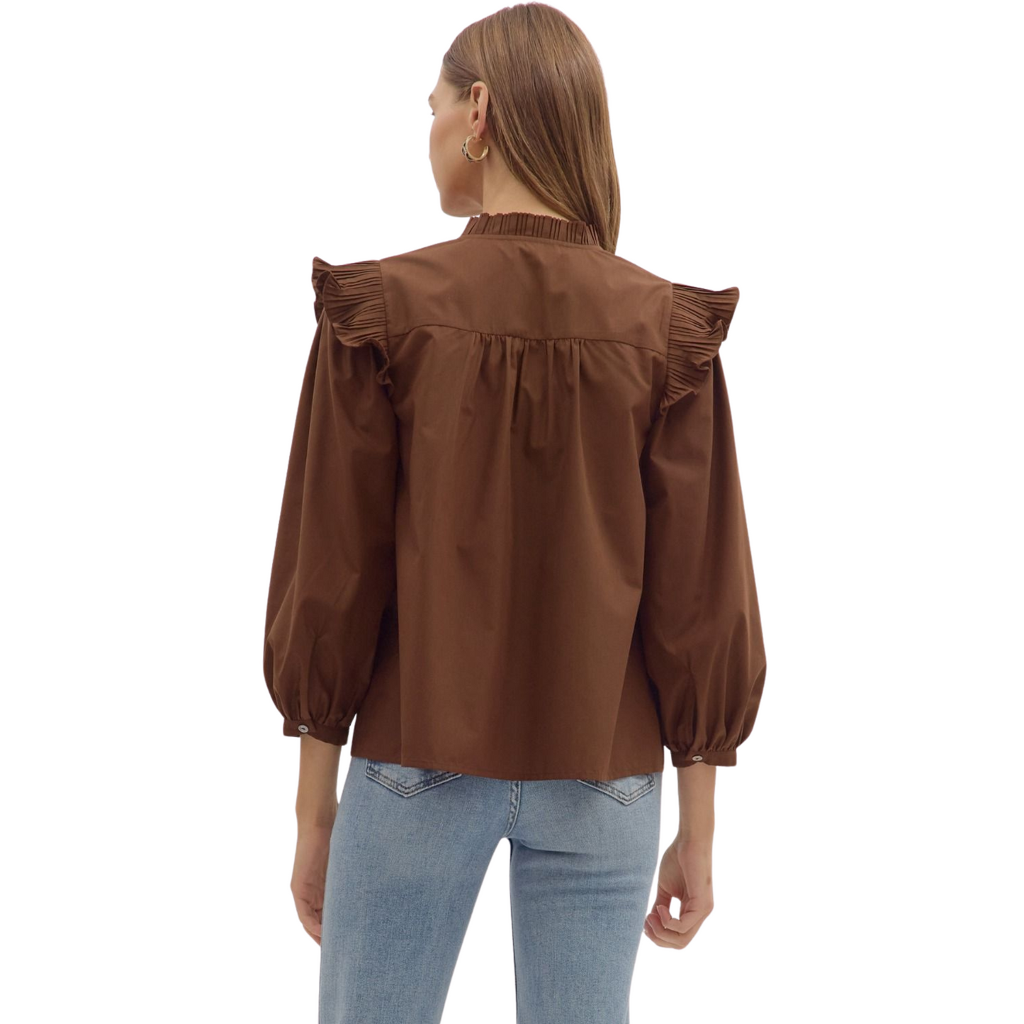 This brown 3/4 sleeve top from Entro features elegant pleated shoulder ruffle details, adding a refined touch to your wardrobe. Its tailored fit and sophisticated design make it ideal for professional settings or stylish casual wear. The 3/4 sleeves provide comfortable coverage while maintaining a polished look.