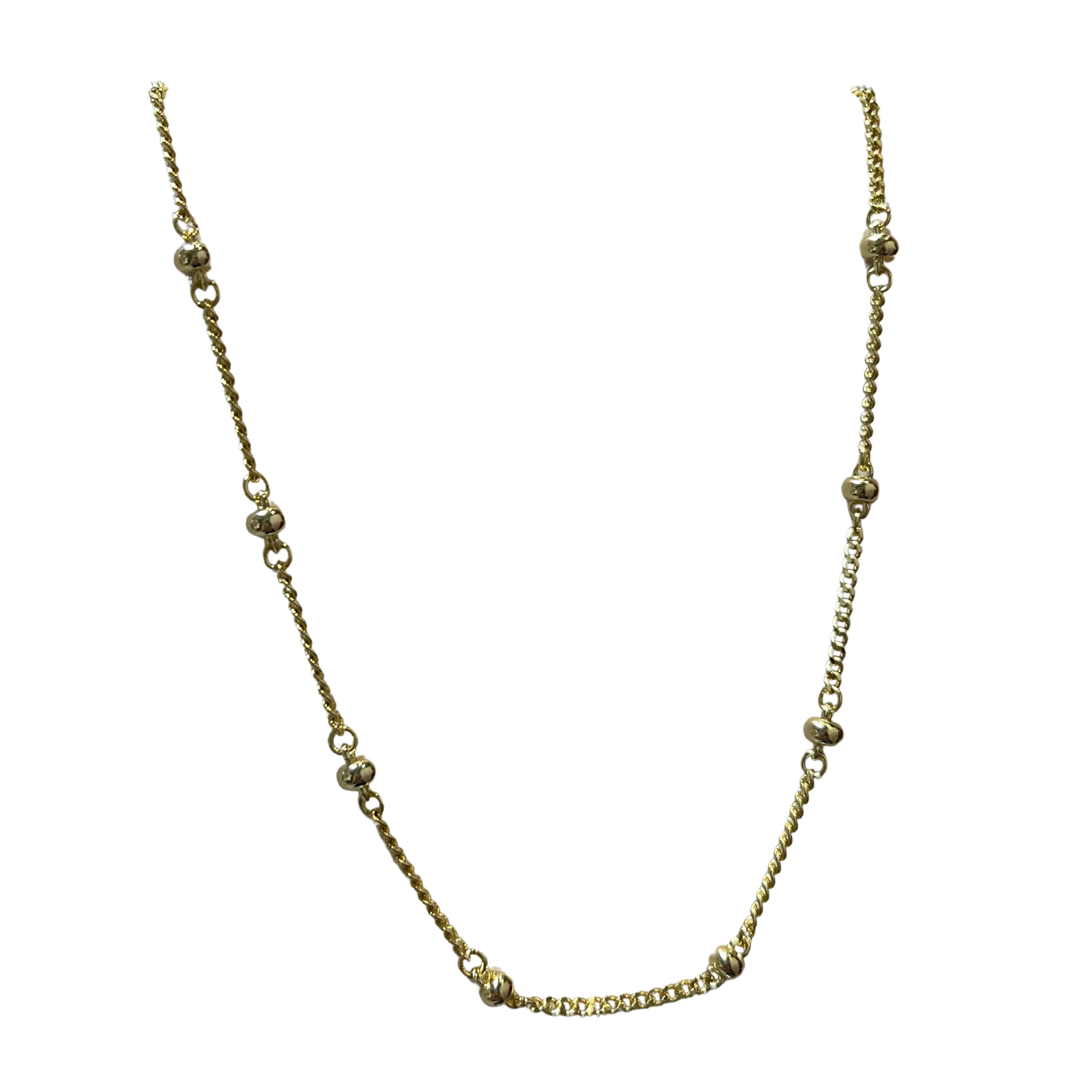 This elegant necklace features a coil design made of gold, with a unique ball accent. The shorter length makes it perfect for layering or as a statement piece on its own. Elevate any outfit with this versatile and stylish accessory.