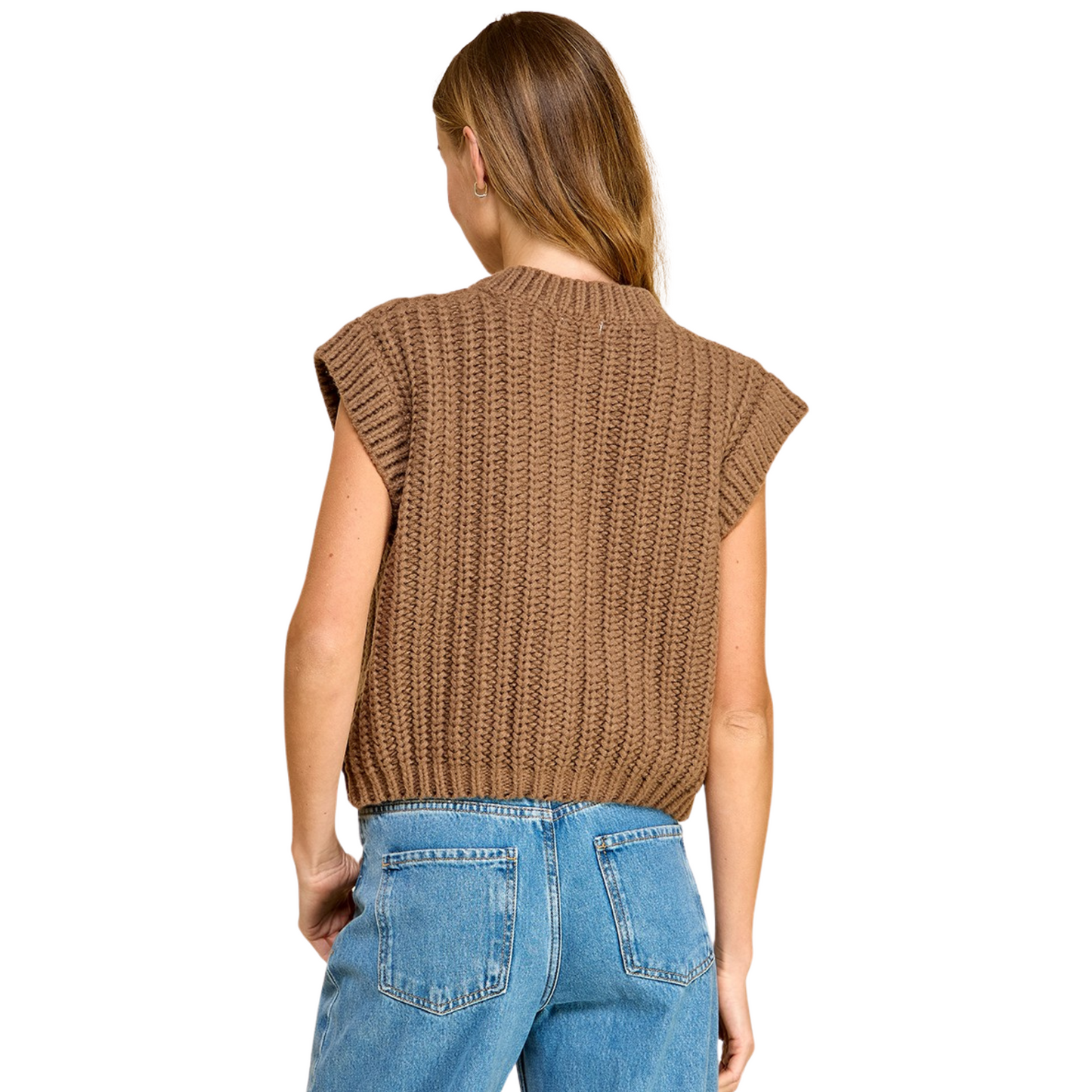 This TCEC brand Sleeveless Knit Sweater Vest comes in a fashionable brown color with an oversized fit. The sleeveless design is perfect for layering and the knit material adds both warmth and style. Stay on-trend with this versatile and comfortable piece.