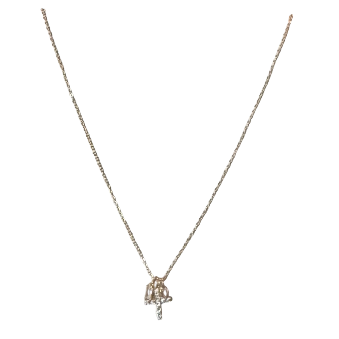 This petite gold cross pendant necklace from Eté combines minimalist design with enduring appeal. The small-scale cross hangs gracefully on a short chain, positioning it perfectly at the collarbone for a refined, intentional look. Crafted in gold, it transitions seamlessly from day to evening wear, offering the kind of understated luxury that discerning customers appreciate. A versatile staple that works beautifully as a standalone piece or layered with other delicate jewelry.