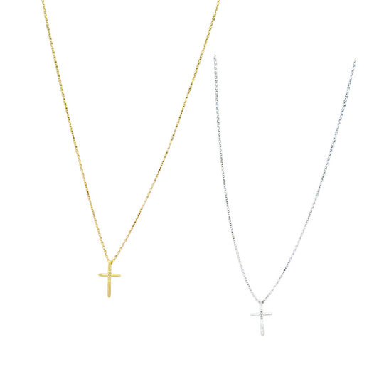 This Small Cross Necklace with Rhinestones by Skosh is available in silver or gold. Its short length makes it perfect for everyday wear, while the tiny rhinestone accents add a touch of sparkle. Elevate any outfit with this elegant and versatile cross pendant.