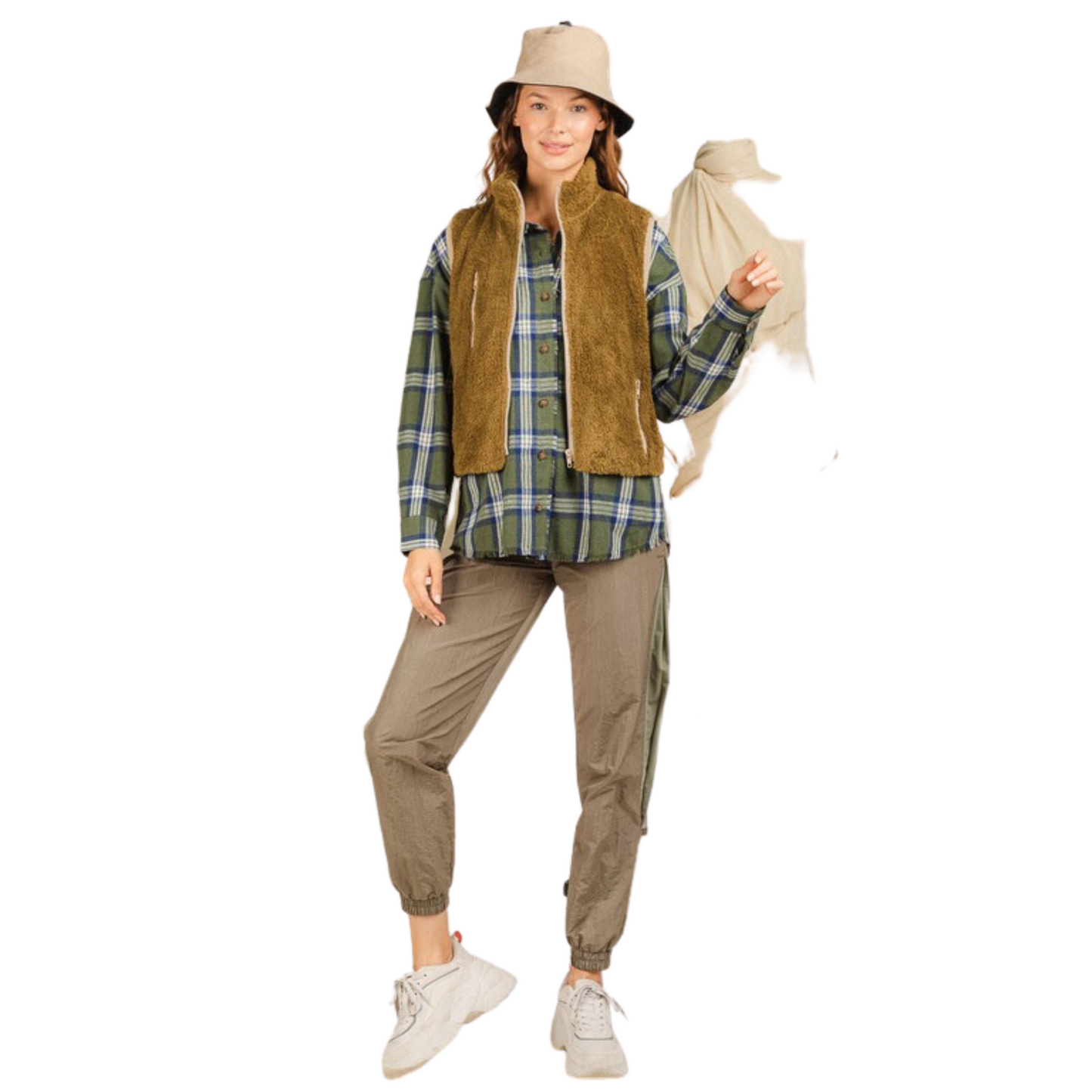 This Soft Fur Vest is the perfect piece to elevate your casual wardrobe. Crafted from luxuriously soft and plush fur, this vest features side pockets and a front zipper for secure closure. With an olive color perfect for any season, this vest is guaranteed to keep you looking and feeling your best.