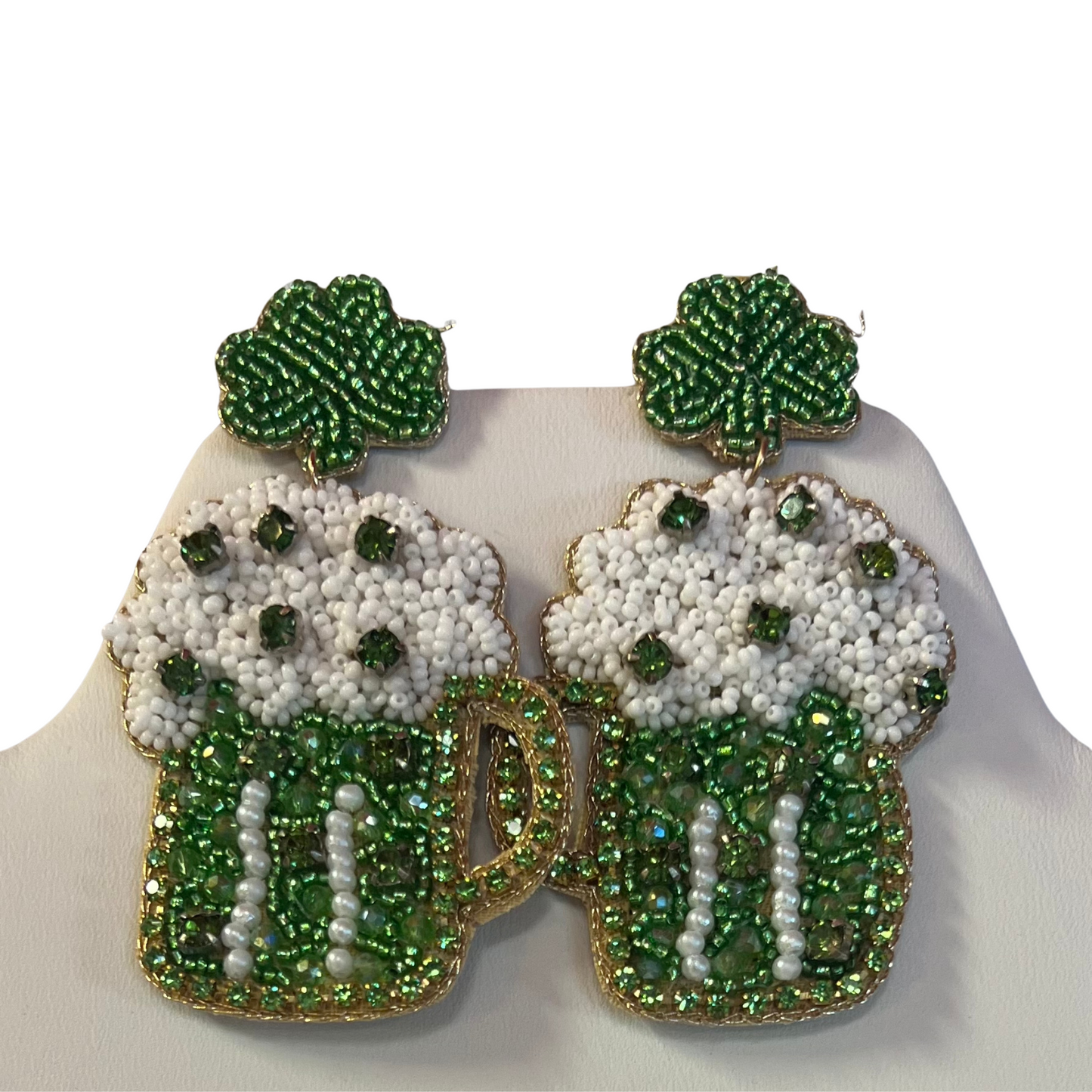 These stunning St. Patrick's Day earrings come in two distinct styles. Both feature gold and green beading, as well as beer mugs and lucky four-leaf clovers. Add a touch of luck to your outfit and celebrate the green with these beautiful accessories.