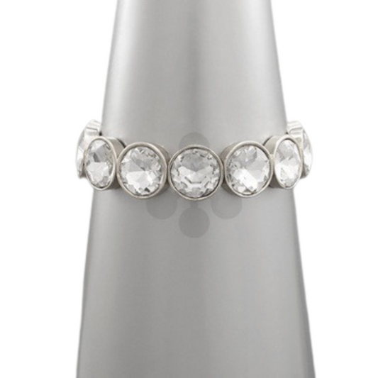This stunning Stretchy Rhinestone Bangle is available in two beautiful colors—silver and gold—each featuring large, sparkling rhinestones. The bangle's elastic design offers a comfortable fit and makes a glamorous addition to any outfit.