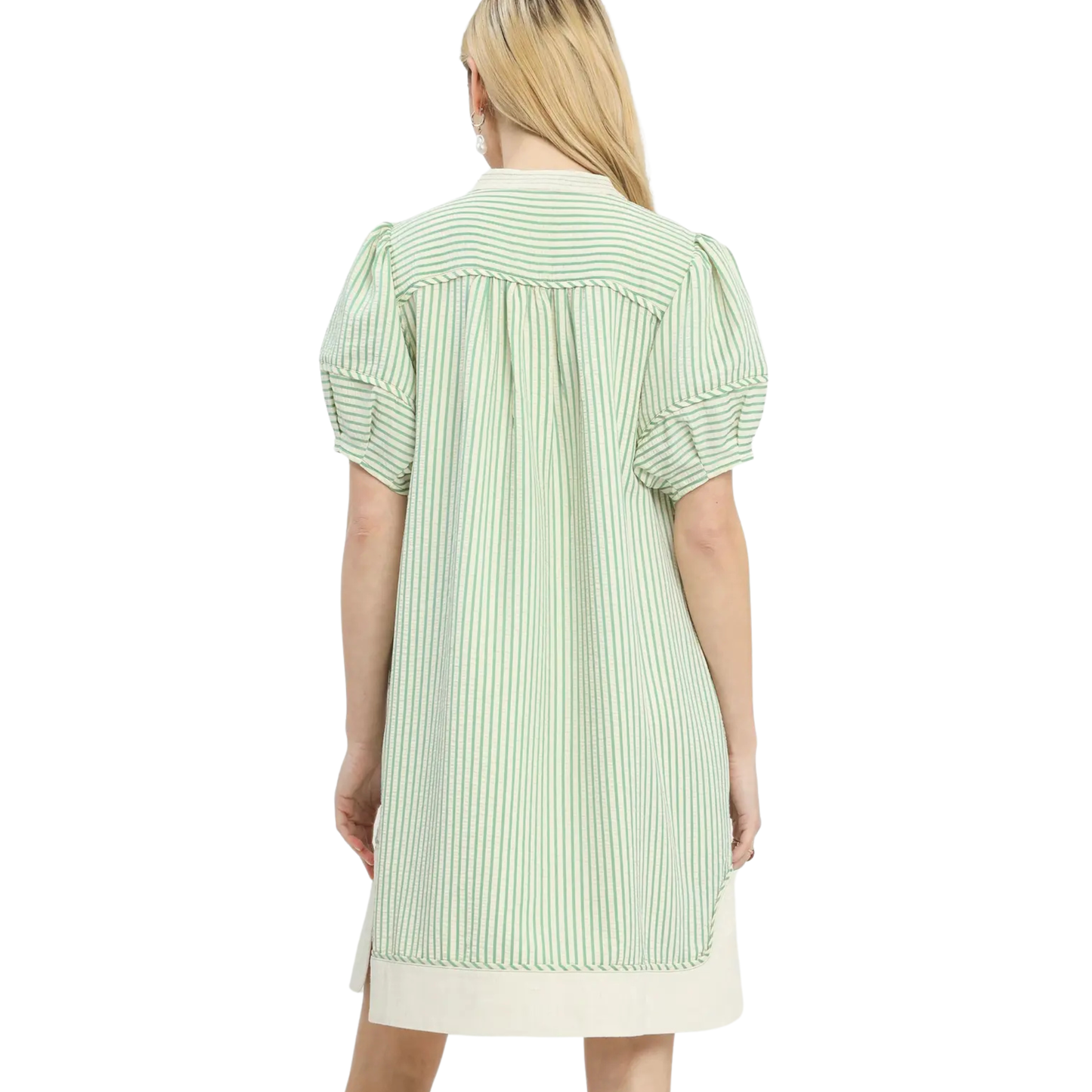 This Umgee striped mini dress combines effortless style with versatile appeal. The sage color palette pairs beautifully with neutral basics or bold accessories, while the classic V-neckline flatters various body types and works across seasons. Crisp stripes add visual interest without overwhelming, making this piece a reliable choice for casual outings, weekend gatherings, or layered styling. The mini length offers a modern silhouette that transitions seamlessly from day to evening wear.