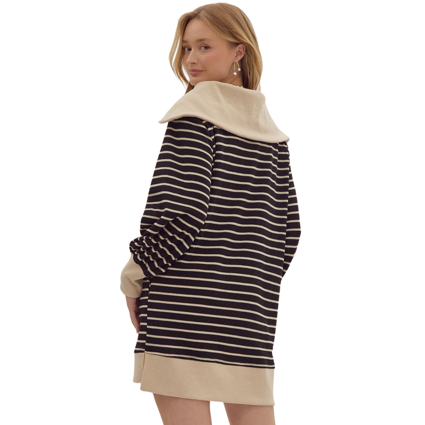 This Striped Ribbed Mini Dress features a bold stripe print and a chic oversized collar. With a zip-up design, long sleeves, and side slits, it offers both style and comfort. Complete with pockets and a lightweight knit material, this dress is perfect for any occasion.