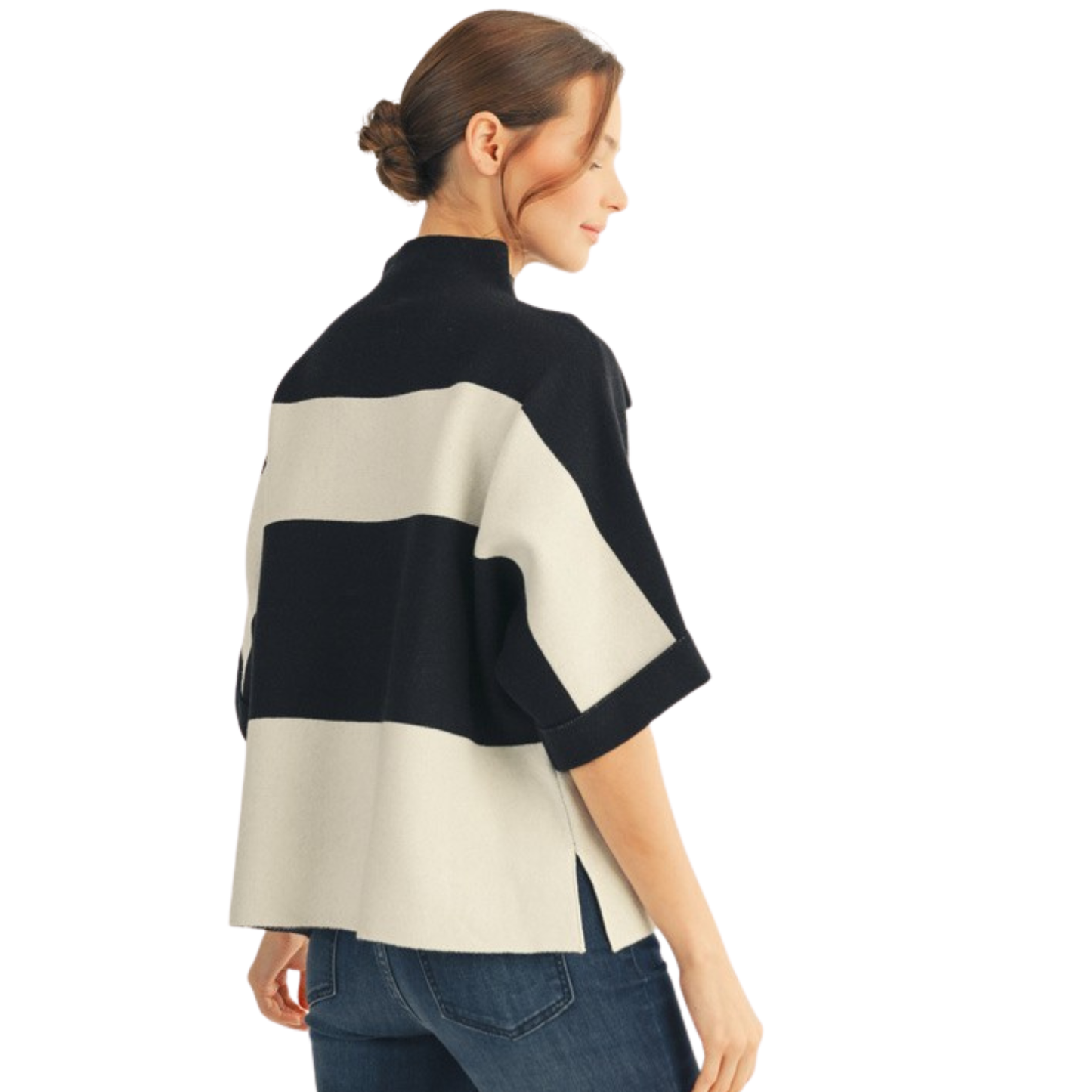 This Jodifl Drop Shoulder Sweater Top features a sophisticated black and white wide stripe pattern complemented by a mock neck for a modern touch. The 3/4 length sleeves balance style and comfort, making it ideal for transitional weather. Its relaxed drop shoulder design ensures an effortless fit, perfect for layering or standing out on its own.