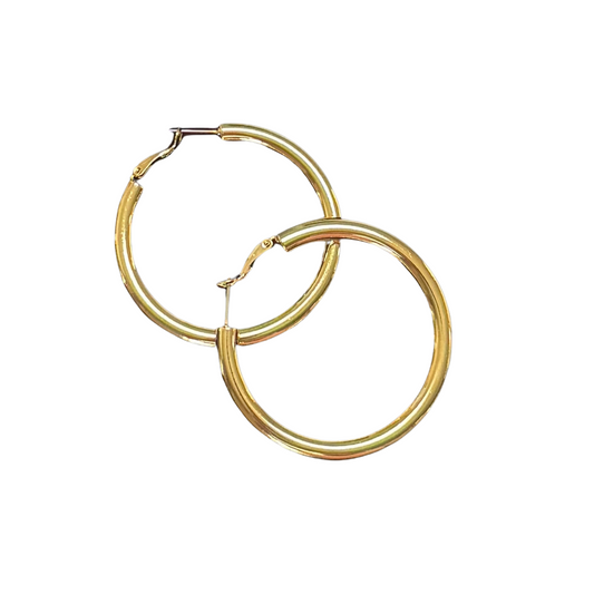 Expertly crafted to perfection, these Thick Hoop Earrings are a must-have addition to any jewelry collection. Made with high-quality gold, these large hoop earrings make a bold statement while providing a timeless elegance. Their thickness adds durability and ensures lasting wear. Elevate your style with these stunning and versatile earrings.