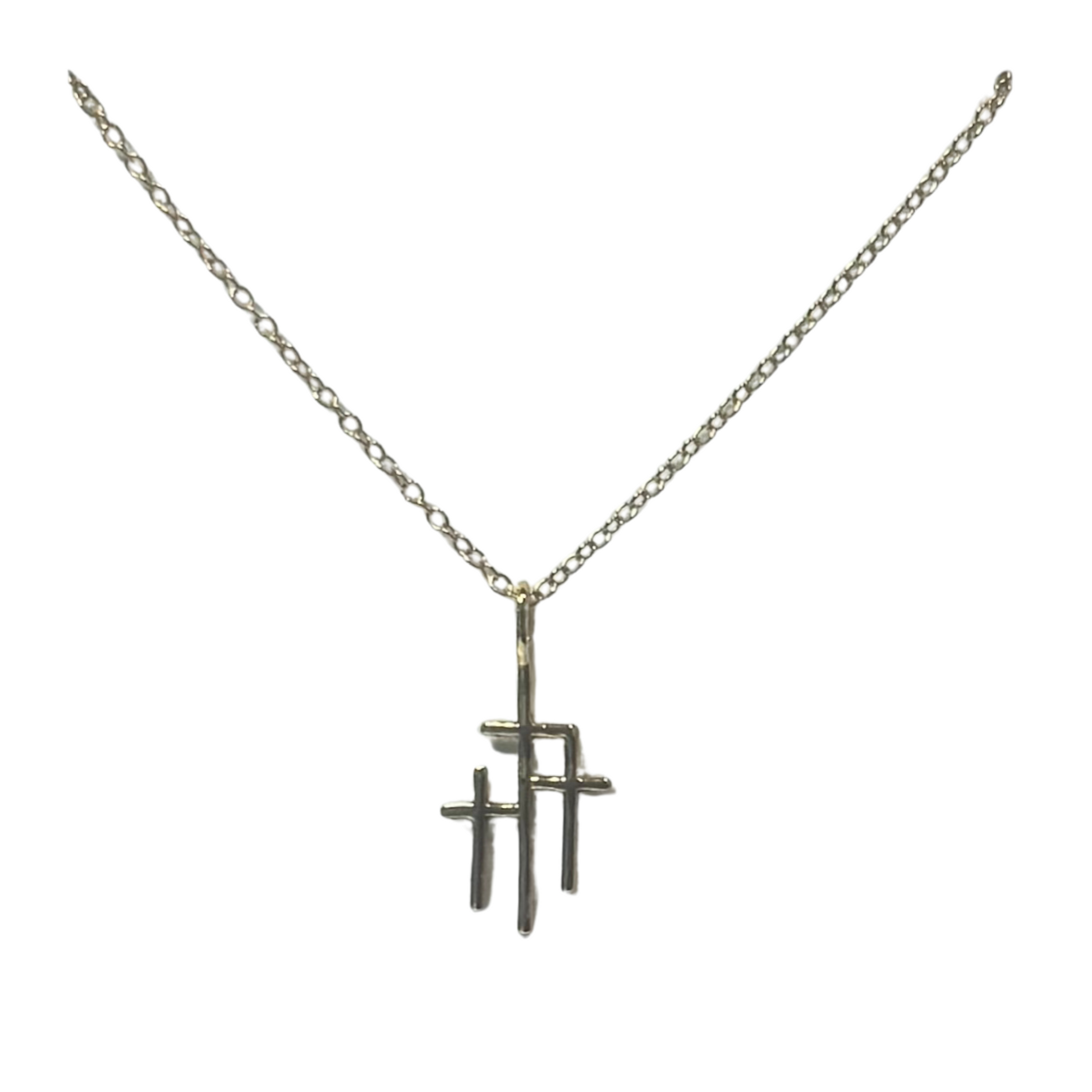 This elegant Three Crosses Necklace features a unique design with three crosses made of high-quality gold. With its stunning design, this necklace from the renowned SKOSH brand is a perfect addition to any jewelry collection. Elevate your style and express your faith with this one-of-a-kind piece.