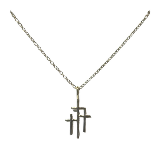 This elegant Three Crosses Necklace features a unique design with three crosses made of high-quality gold. With its stunning design, this necklace from the renowned SKOSH brand is a perfect addition to any jewelry collection. Elevate your style and express your faith with this one-of-a-kind piece.
