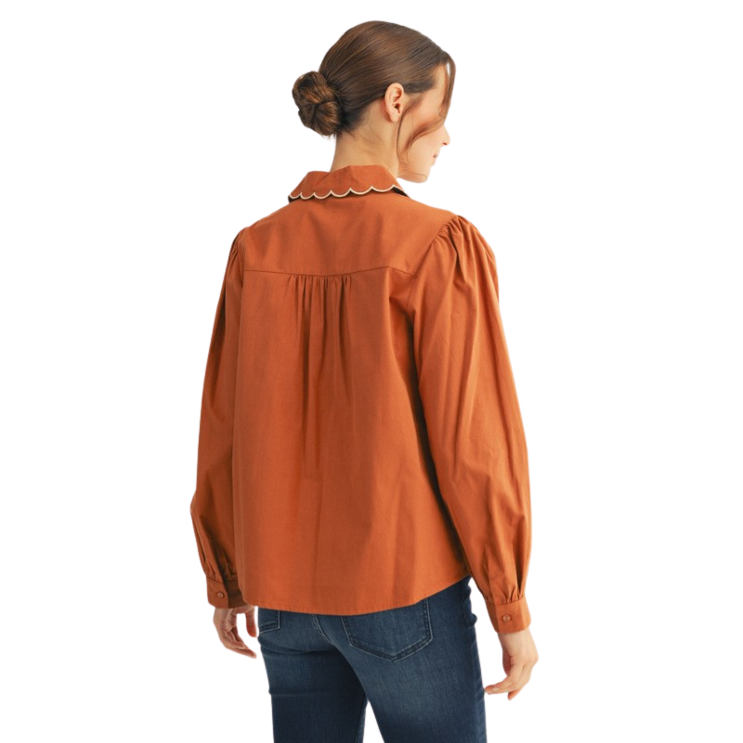 Elevate your wardrobe with this sophisticated Jodifl button-down top, featuring a distinctive scalloped collar that adds refined detail to any ensemble. The rich toffee hue offers versatile styling options, pairing effortlessly with denim, trousers, or skirts for both professional and casual occasions. Long sleeves provide coverage and elegance, while the structured button-front design ensures a polished, put-together appearance. A timeless piece that transitions seamlessly from office to weekend wear.