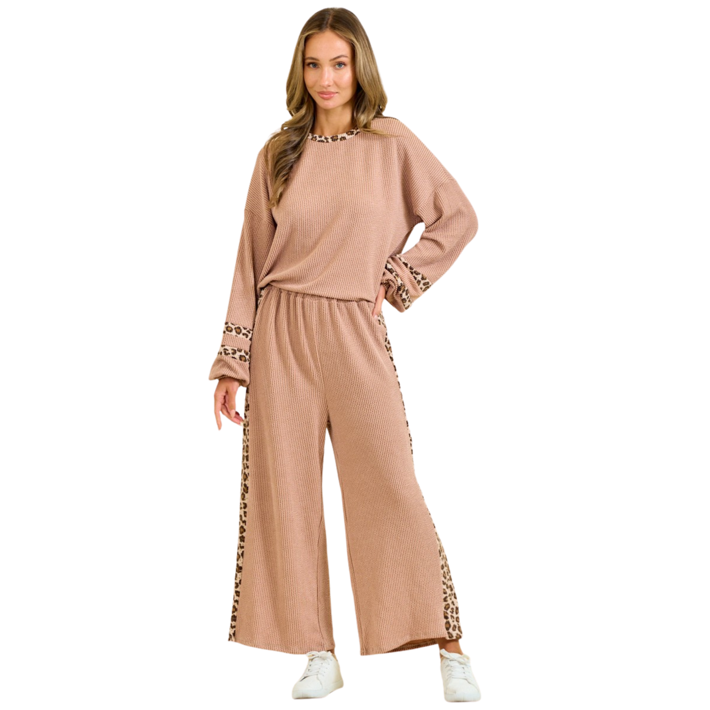 Cozy up in this adorable two-piece set from Lovely Melody. The taupe ribbed top and matching pants feature charming leopard print details throughout. Long sleeves keep little ones warm and comfortable all day long. Perfect for playtime or casual outings, this coordinated set makes getting dressed easy and stylish.