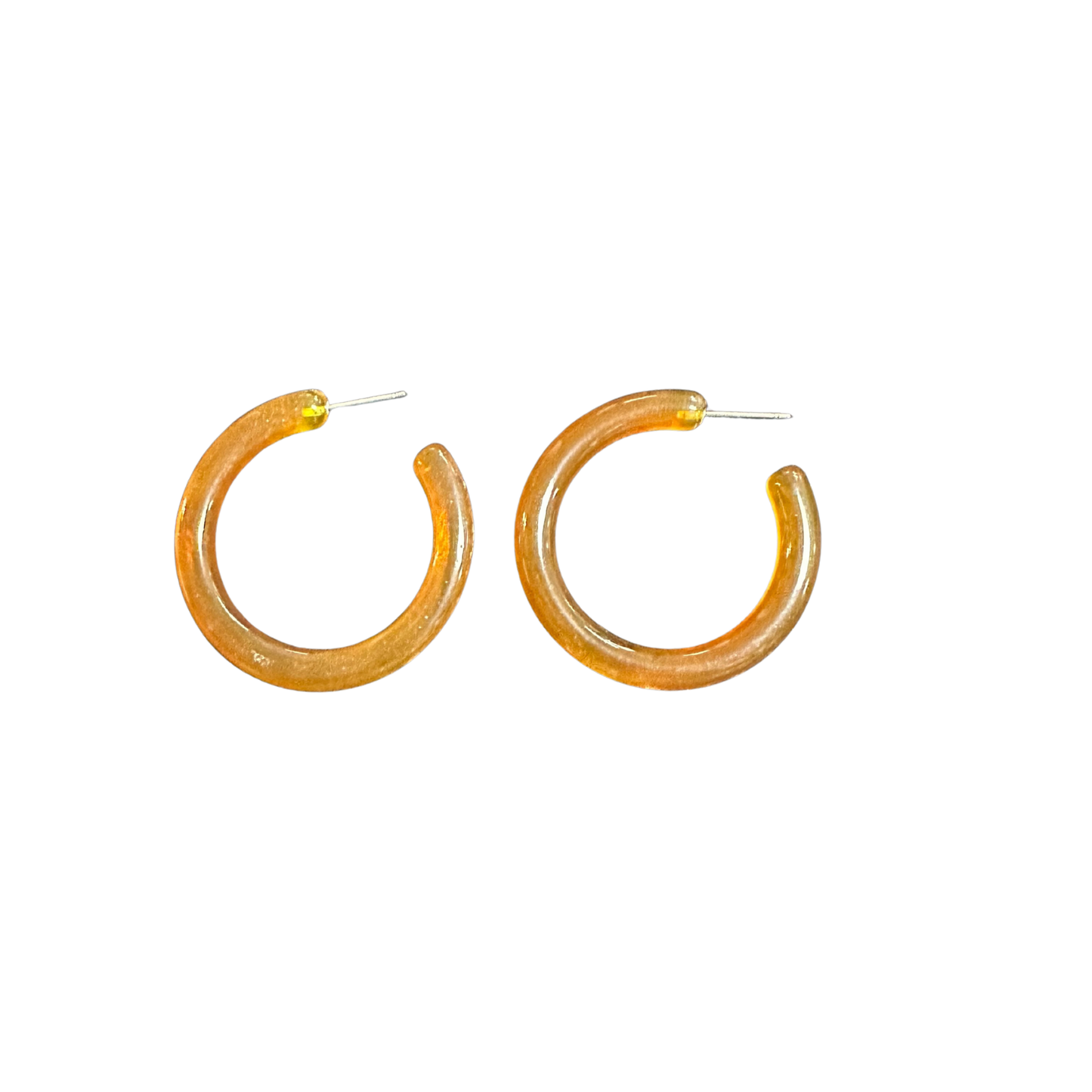 Elevate your jewelry collection with these striking translucent hoop earrings from Perdido Gems. Crafted with precision, the medium-sized hoops showcase a luminous, see-through design that catches light beautifully while maintaining an understated elegance. Perfect for layering or wearing solo, these versatile earrings transition seamlessly from day to evening wear. The translucent material offers a modern aesthetic that complements any skin tone, making them an essential addition to your accessory wardrobe