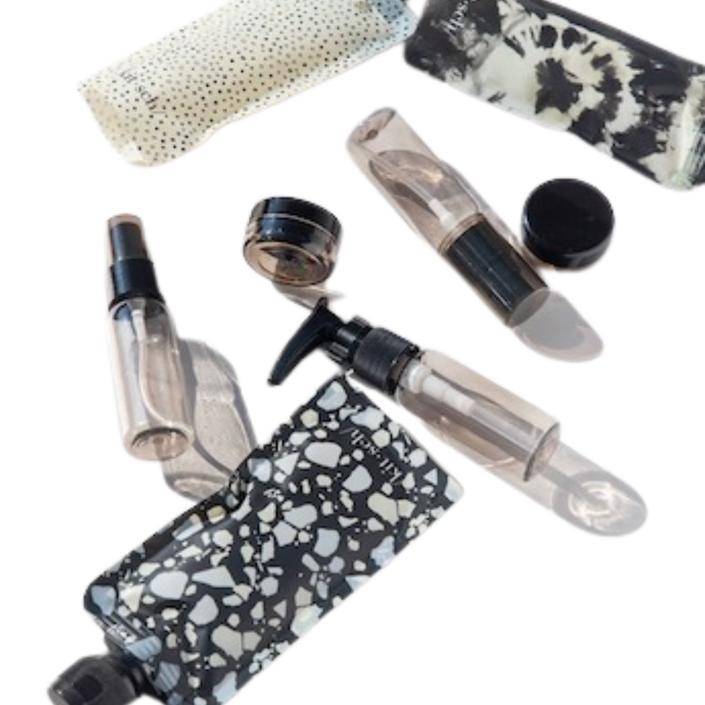 The Ultimate Travel Set is your perfect companion for hassle-free travel. With its convenient mini packing tools, including a spray bottle, pump bottles, mini jars, and flat pouch bottles, you can easily carry your favorite liquids in a reusable travel pouch. Made with BPA-free materials, this stylish set not only meets TSA carry-on liquid requirements but is also environmentally friendly. Keep your vanity clutter-free and make your packing process a breeze with this dishwasher safe set.