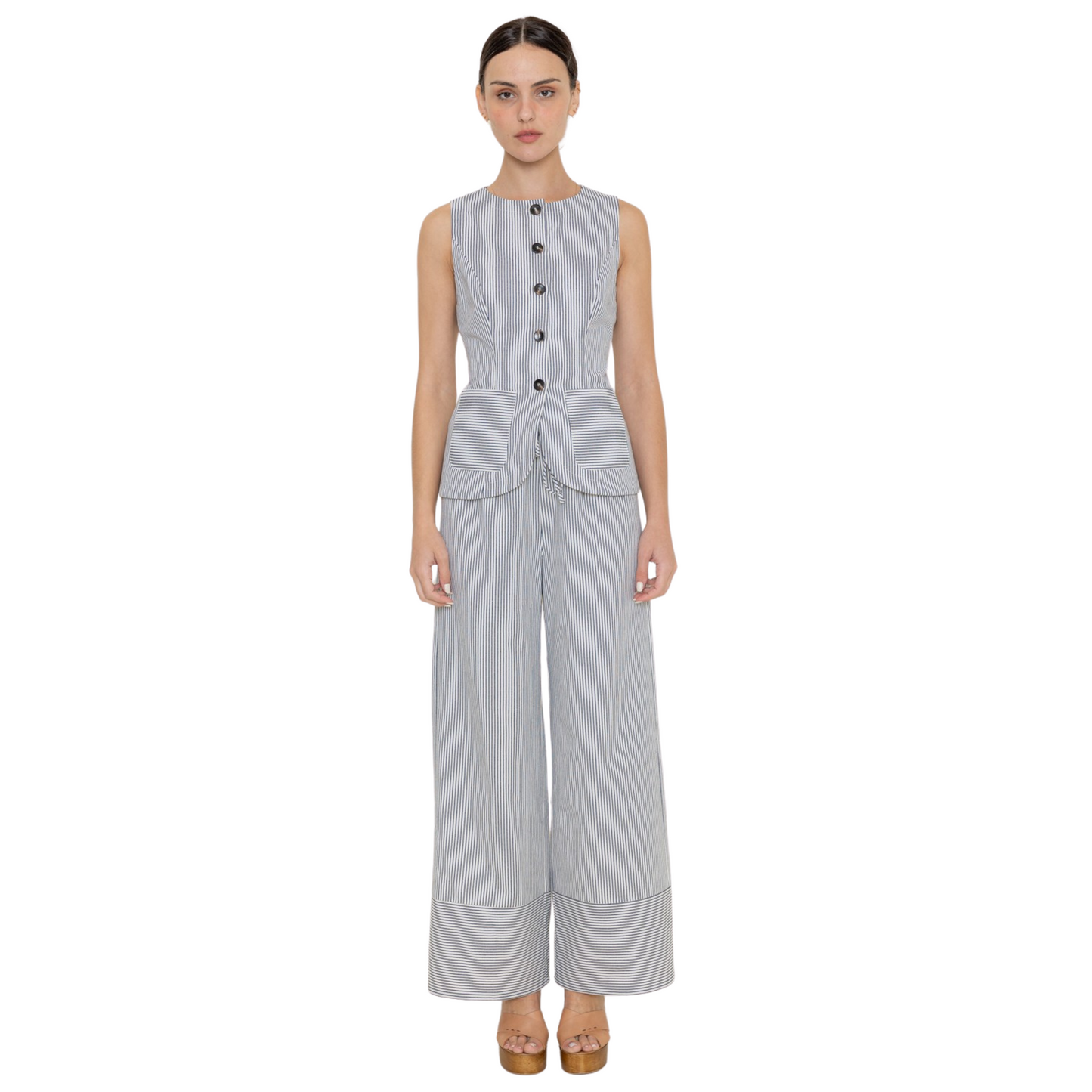 Discover effortless sophistication with this Striped Button-Up Vest and Pants Set from Fore Collection. This expertly crafted two-piece ensemble delivers versatile style for the modern wardrobe.