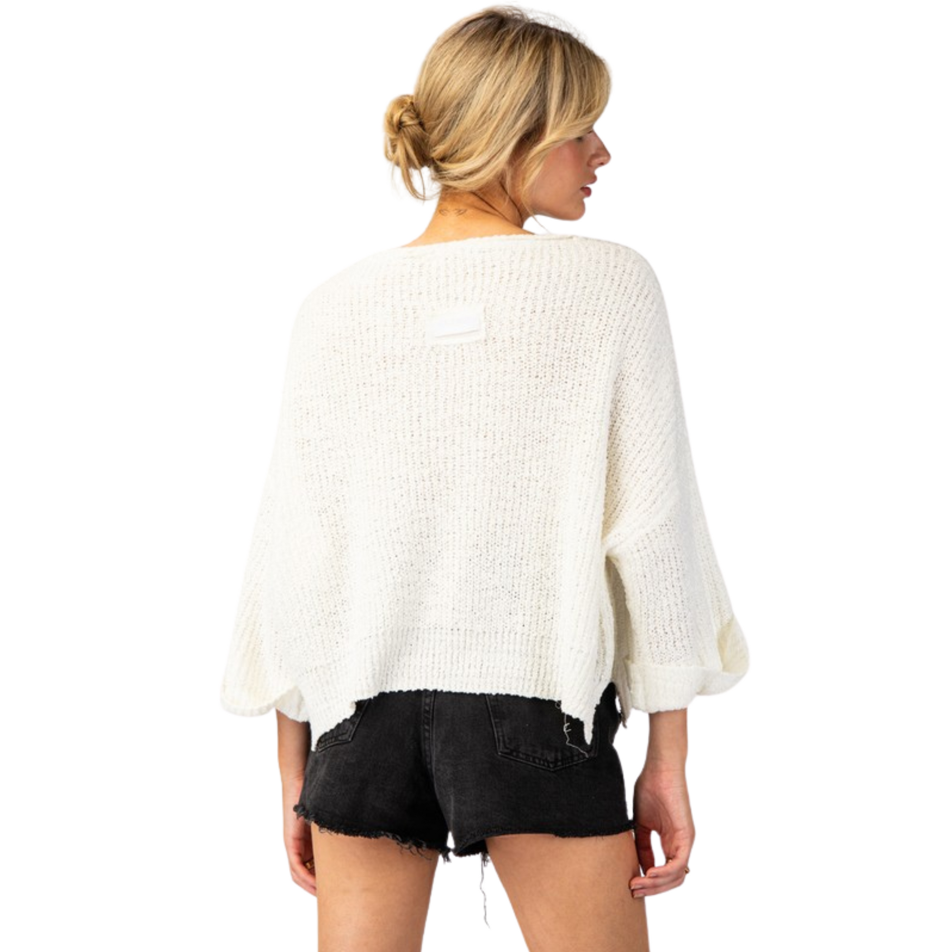 This off-white textured V-neck sweater from ee:some offers a classic and versatile addition to any wardrobe. With long sleeves and a textured design, this sweater provides both comfort and style in one piece. Elevate any outfit with this must-have essential from a trusted brand.