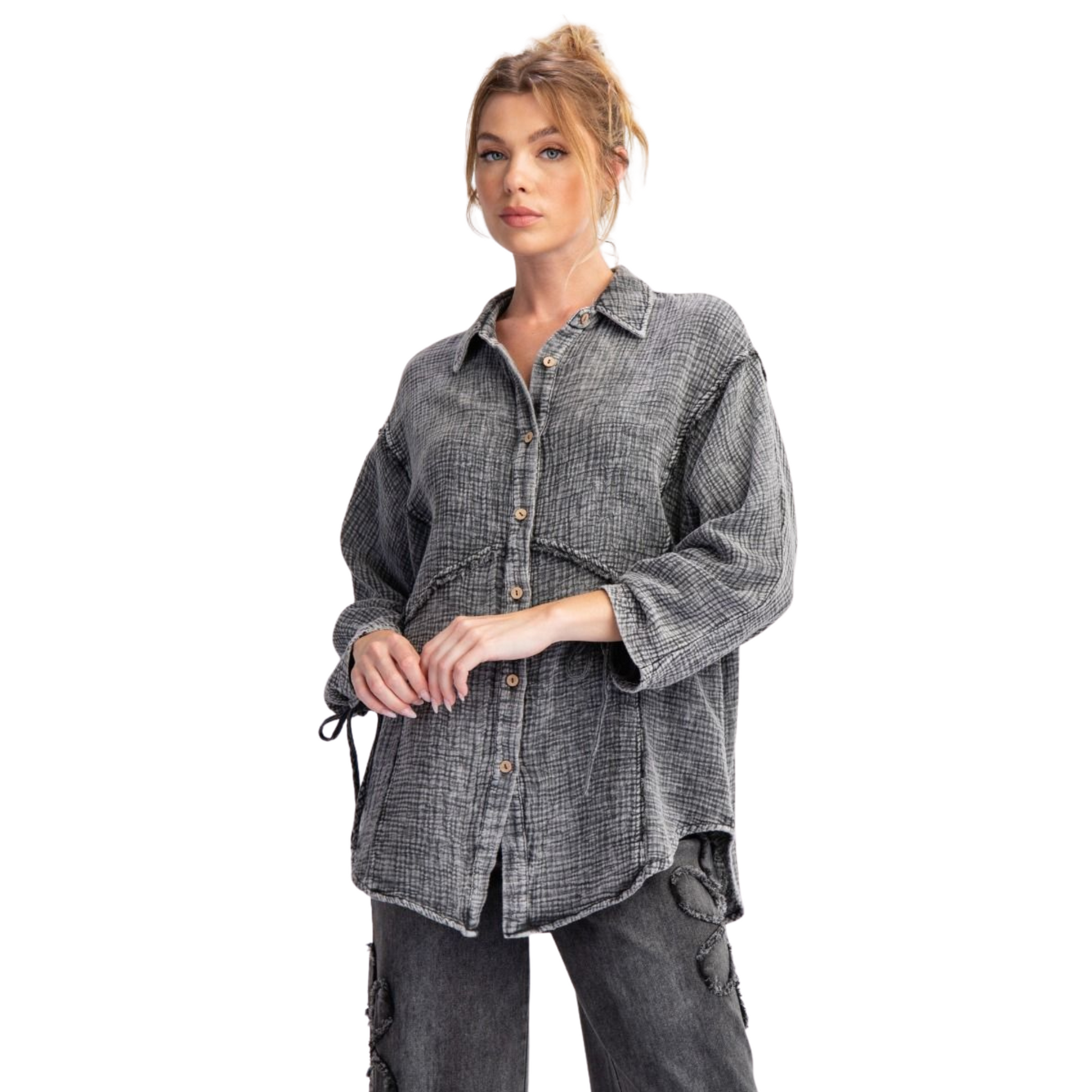 This Washed Cotton Gauze Top from Easel combines lightweight comfort with refined style. Crafted from a breathable gauze cotton blend, it features long sleeves and a classic button-down design for versatile layering. The washed black color adds a subtle, lived-in look, ideal for both casual and polished outfits. Perfect for those seeking breathable fabric with a soft, textured feel.