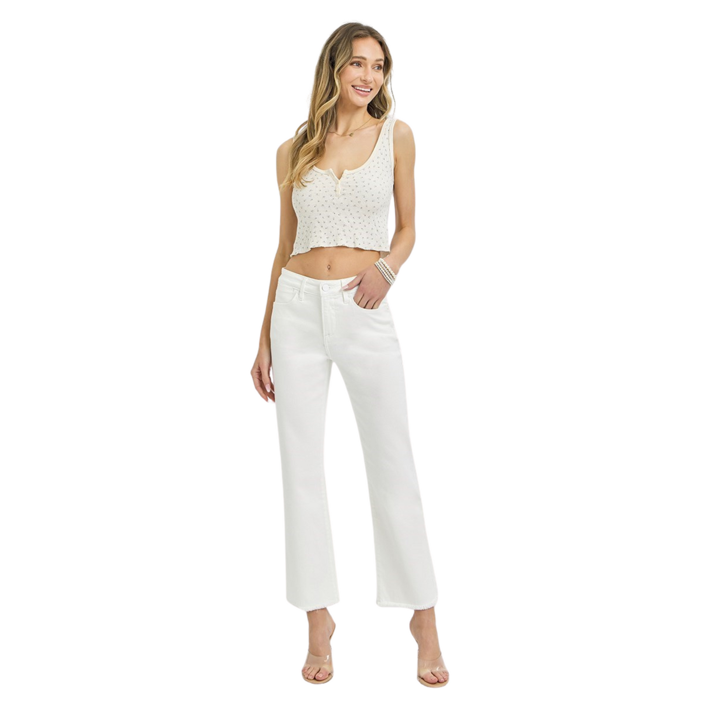 Expertly crafted with tummy control technology, these Mid Rise Cropped Frayed Hem Jeans from Risen provide a flattering fit while the raw hem adds a trendy touch. Made from white denim, these cropped jeans are the perfect addition to your wardrobe for a stylish and slimming look.