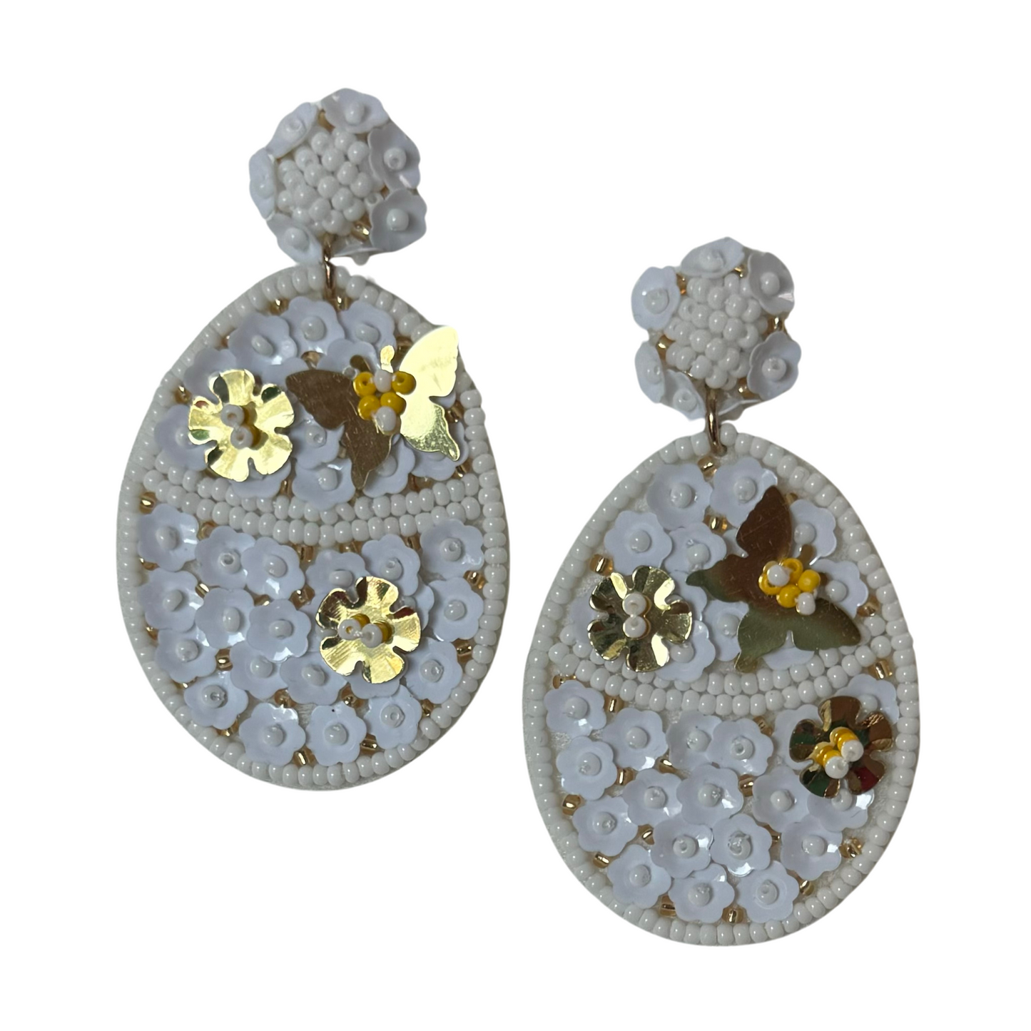 White egg Easter dangle earrings with gold accents