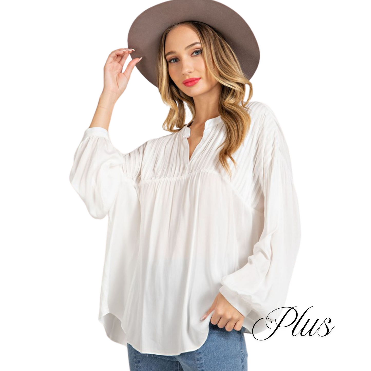 Introducing our V-Neck Puff Sleeve Top in a versatile off-white shade. The puff sleeves add a touch of sophistication while the v-neckline flatters all body types. Perfect for plus sizes, this top from ee is a must-have for any fashion-forward wardrobe.