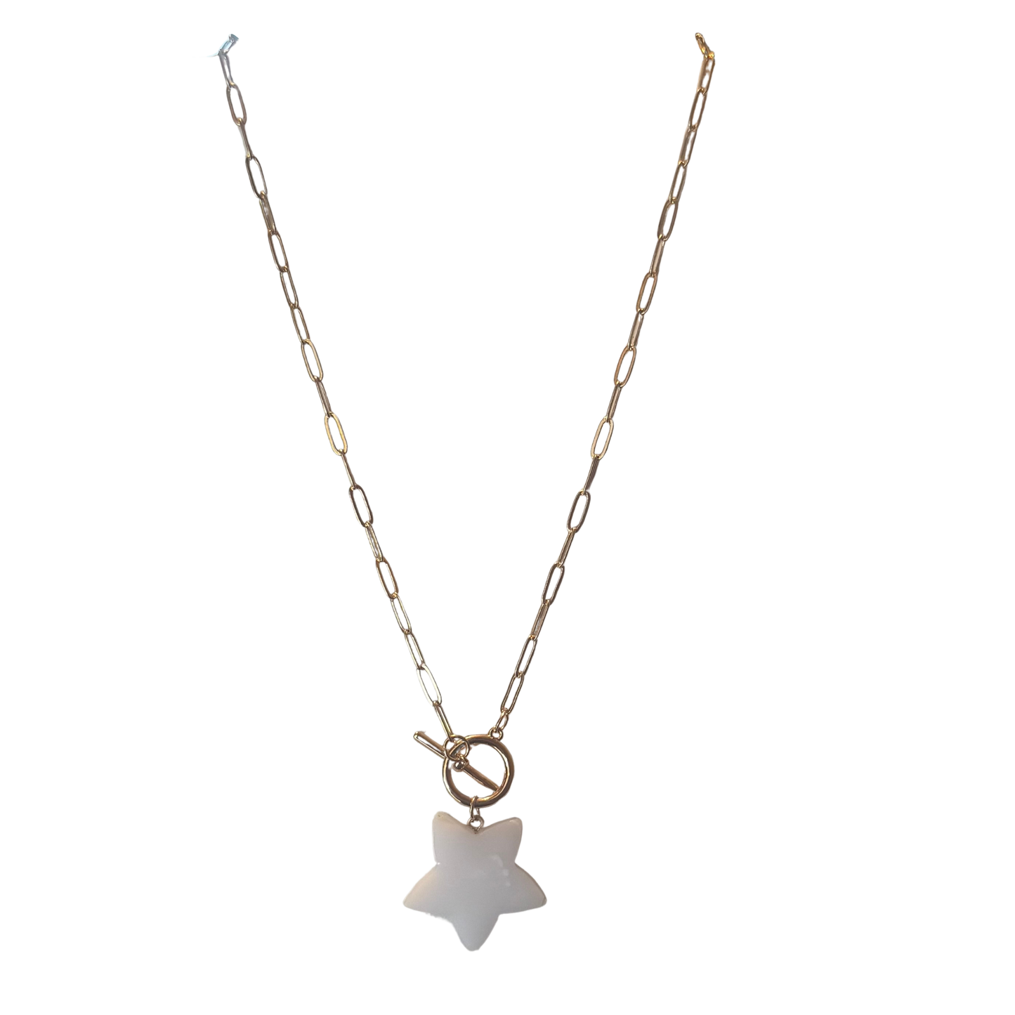 This White Star Necklace from Tell Your Tale combines timeless elegance with refined craftsmanship. The luminous white star pendant is suspended from a meticulously designed gold chain link, creating a piece that balances delicate aesthetics with substantial presence. The articulated chain construction allows for graceful movement while maintaining structural integrity.