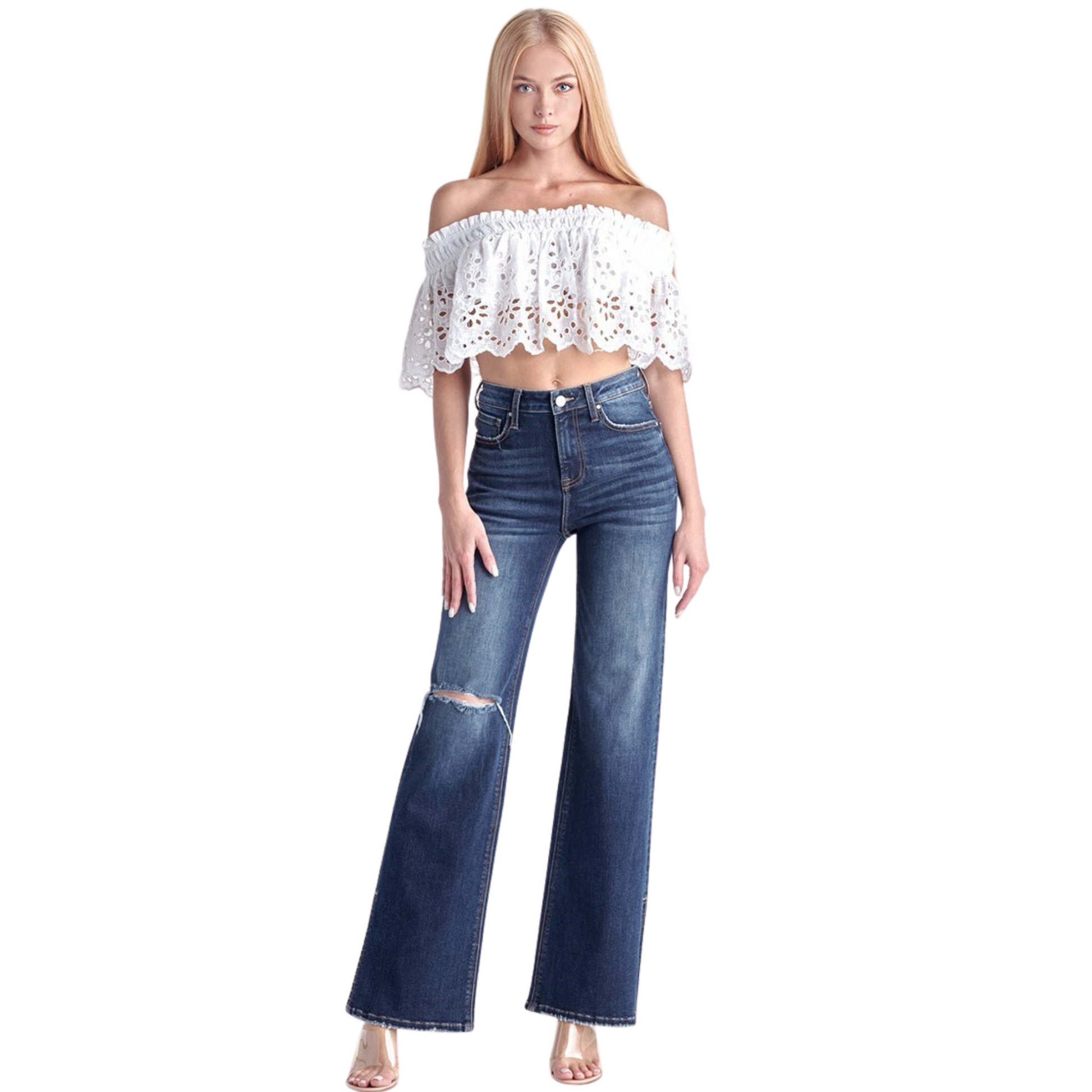 Our High Rise Distressed Wide Flare Jeans are the perfect combination of style and comfort, constructed from durable dark wash denim. The high rise accentuates your figure while the distressed details and wide flare provide an on-trend look. Dress it up or dress it down - you can't go wrong either way.