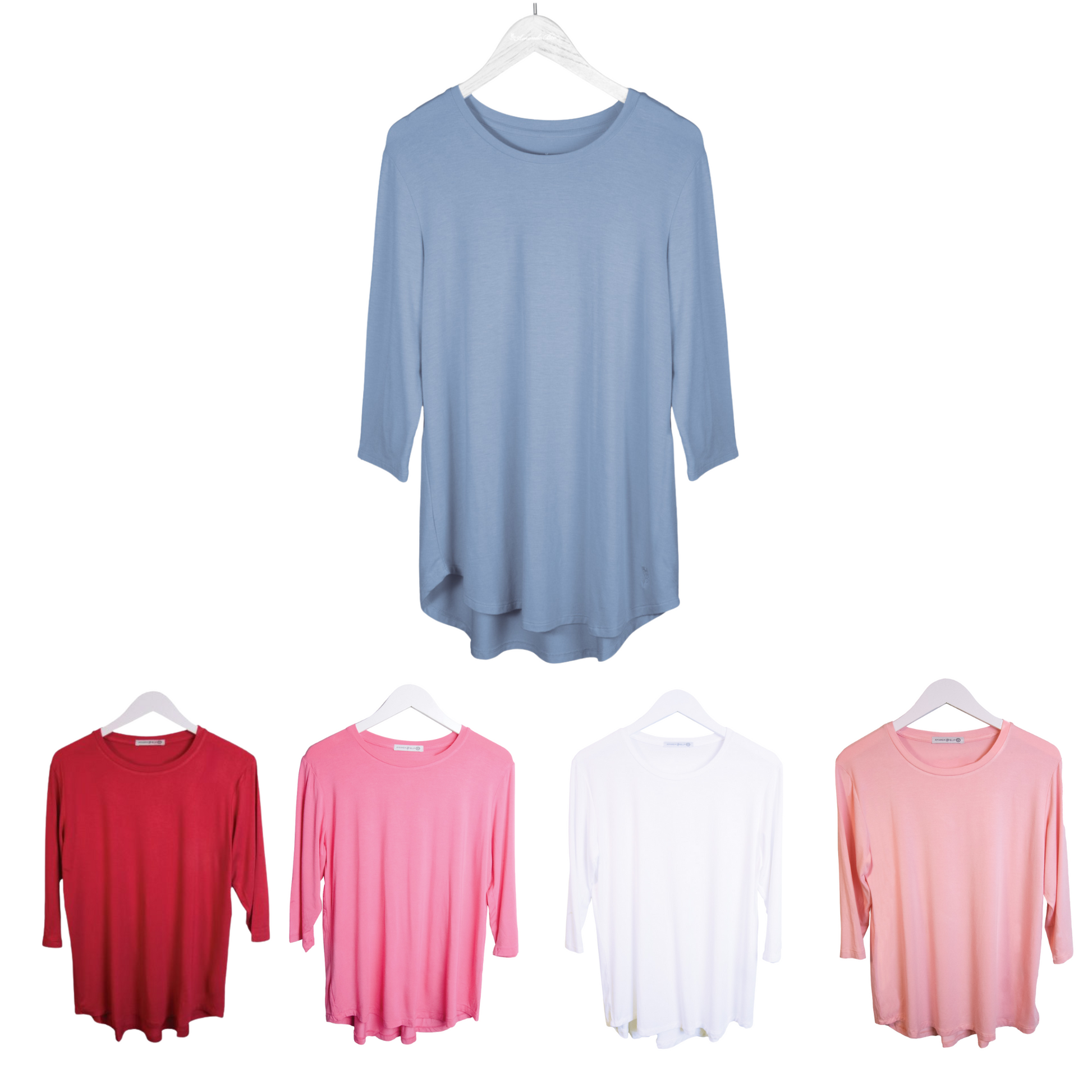 This 3/4 Length Sleeve Top by Amanda Blu is available in blue, white, light pink, and dark pink. With its 3/4 length sleeves, it combines fashion and comfort for everyday wear. Choose from a variety of colors to fit your personal style.