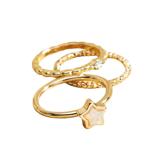 3 piece drusy ring set in gold. one star design, one small rhinestone, and one beaded
