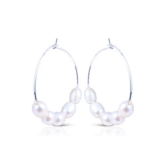 Expertly crafted, these 5 Pearl Hoop Silver Earrings are a must-have accessory for any jewelry collection. Made with sterling silver and genuine pearls, these earrings are both elegant and timeless. With a classic hoop design and 5 exquisite pearls, they add a touch of sophistication to any outfit.