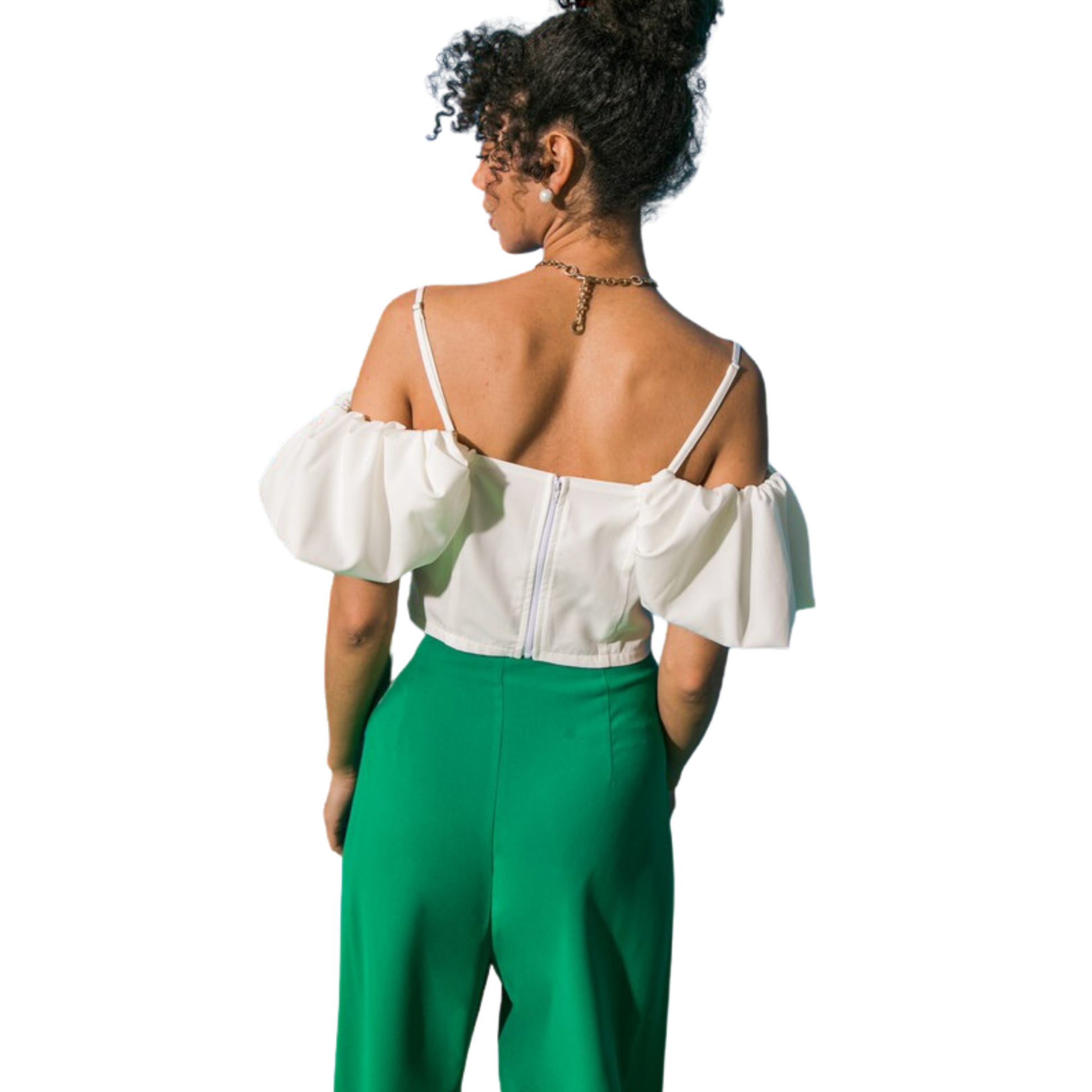 This white cold shoulder top is the perfect way to add a touch of graceful femininity to your look. The delicate ruffle detail provides an added flair and the cropped cut creates a flattering silhouette.