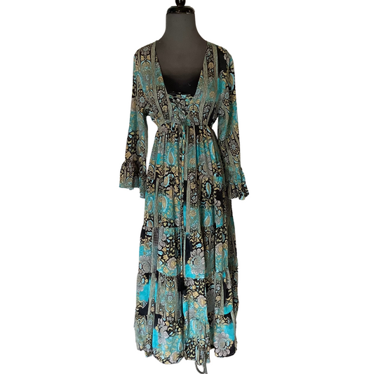 Look stylish and chic with the beautiful Criss Cross Maxi Dress. Crafted from a lightweight polyester-cotton blend fabric, this bohemian dress is designed with a flattering criss cross pattern and a maxi cut. Perfect for any occasion!